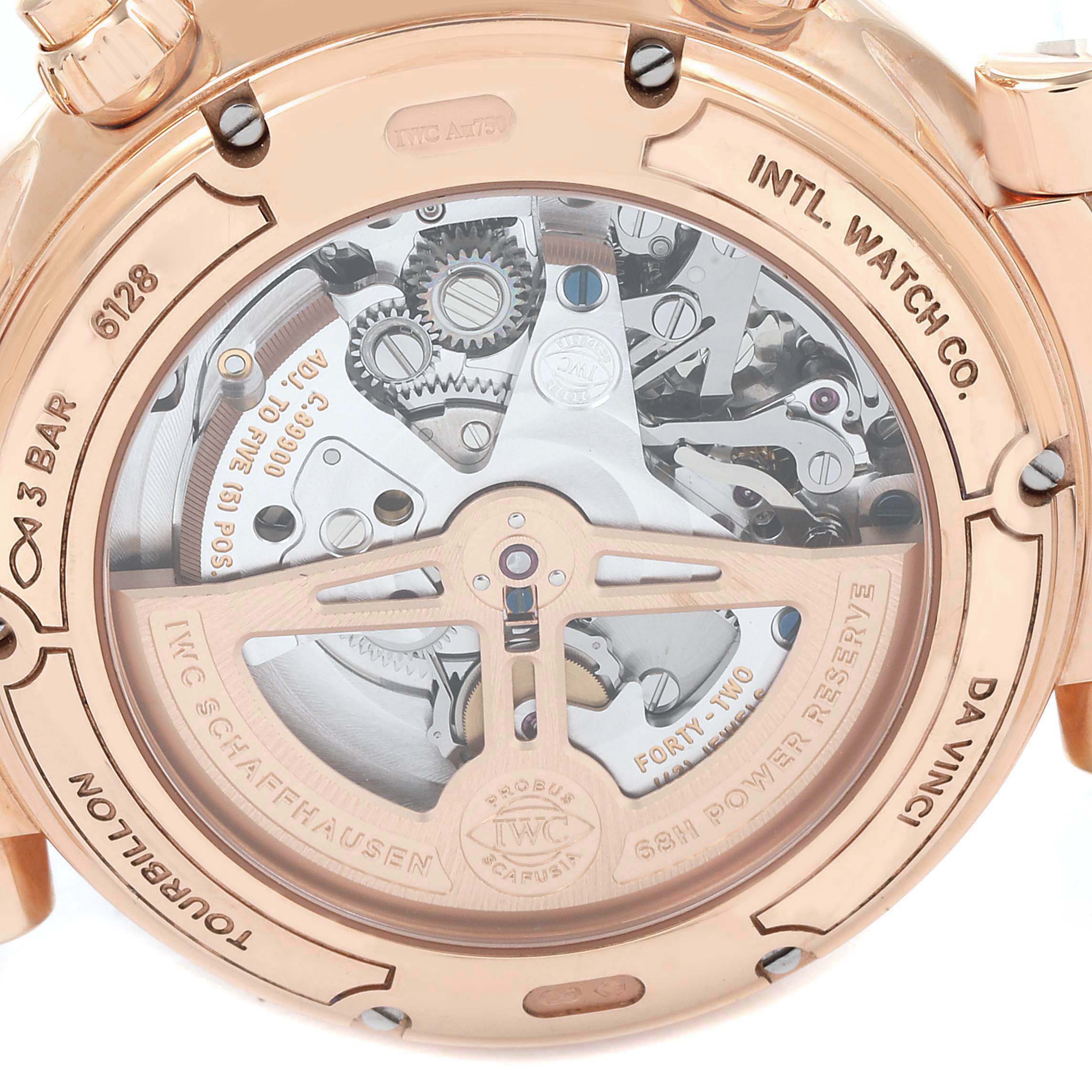 The IWC Da Vinci IW393101 Men's Rose Gold Silver Dial watch is shown from the back, highlighting the intricate inner mechanics and engravings on the case.