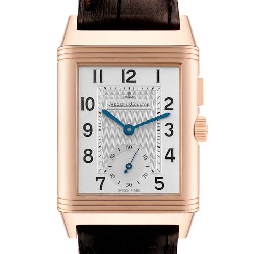 The Jaeger-LeCoultre Reverso watch is shown from a frontal angle, displaying its face and crown.