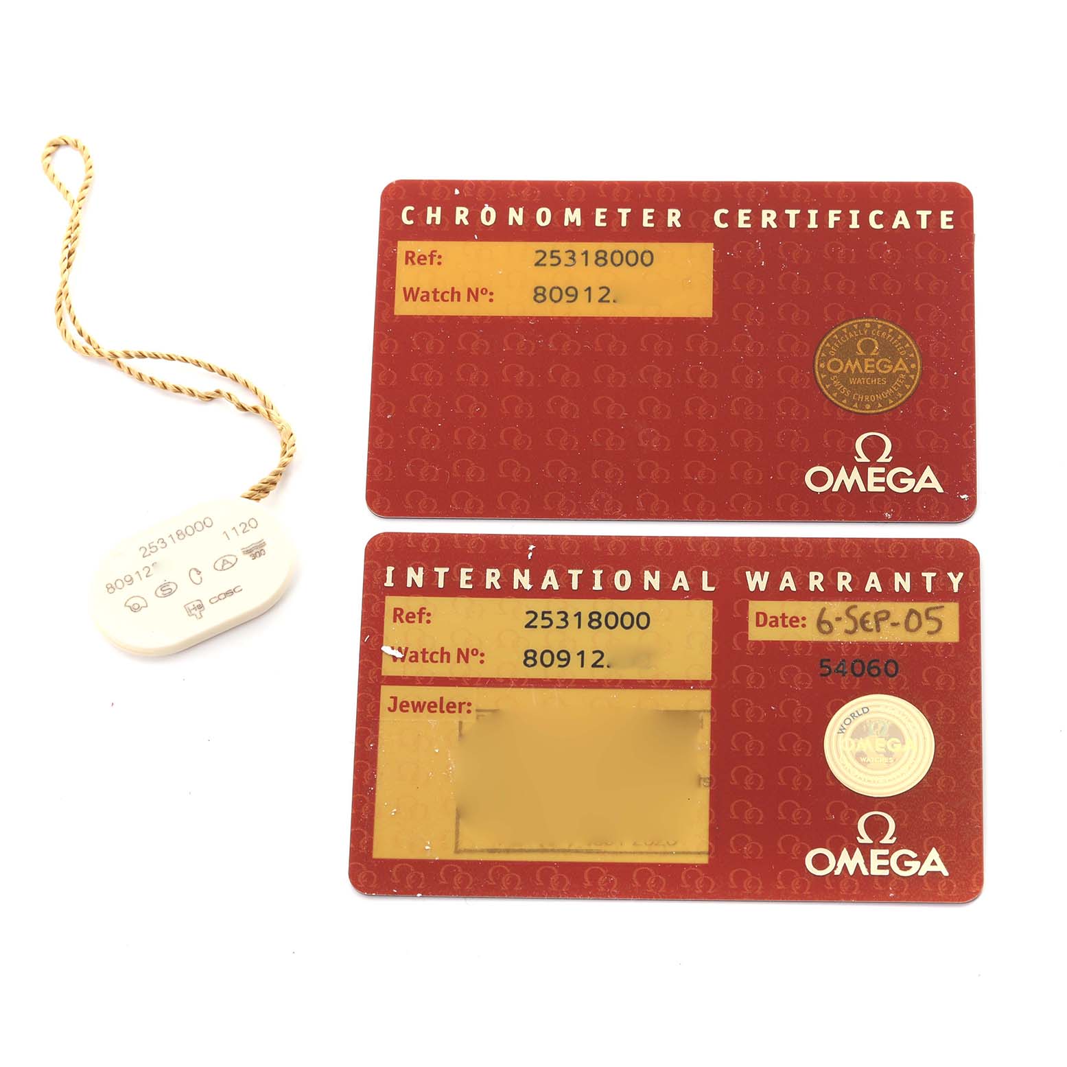 The image shows Omega Seamaster 2531.80.00 Men
s Stainless Steel Blue Dial 2531.80.00 Men
s Stainless Steel Blue Dial
s chronometer certificate, international warranty cards, and a serial tag.