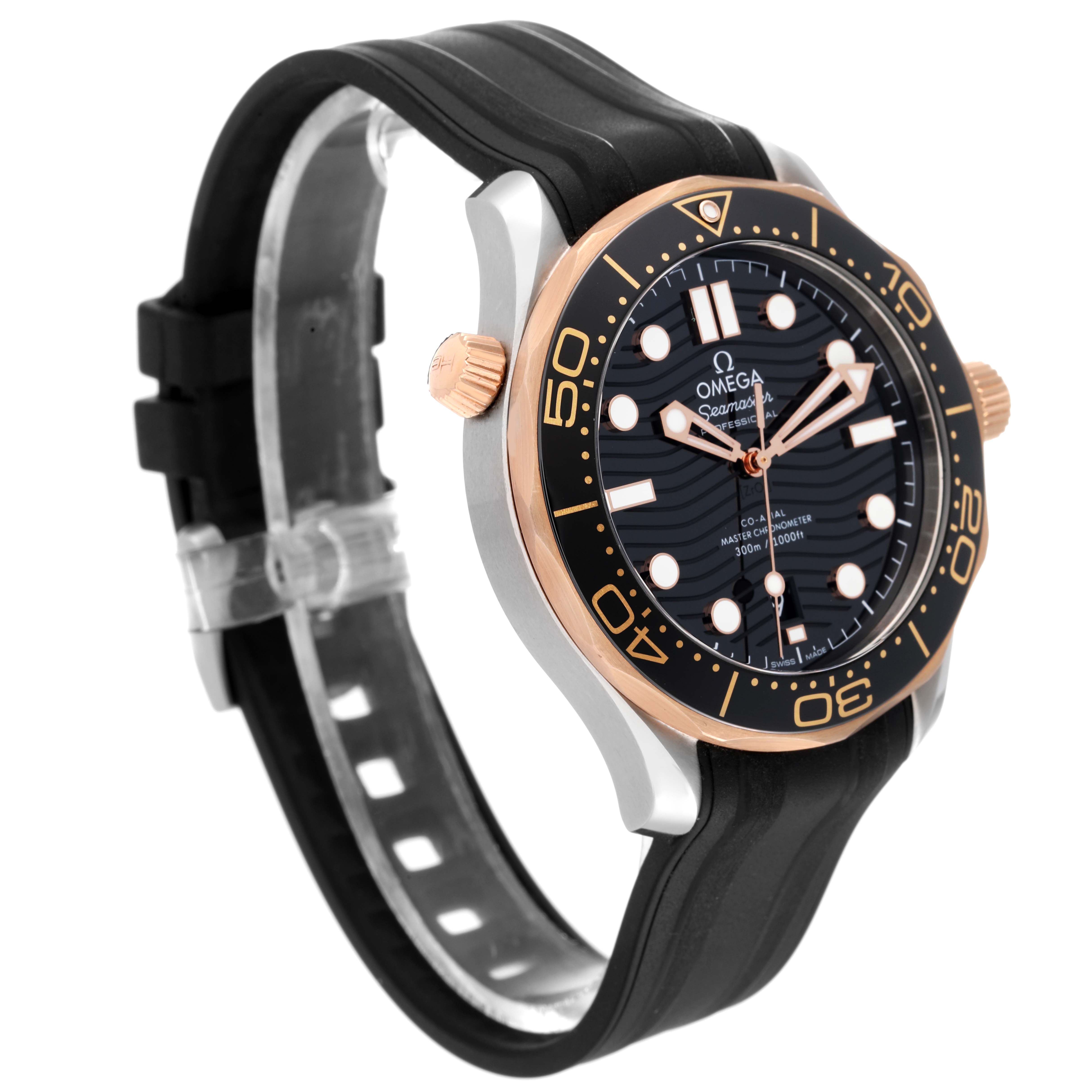 The image shows a front-side angle of an Omega Seamaster 210.22.42.20.01.002 Men's Steel and Gold (two tone) Black Dial 210.22.42.20.01.002 Men's Steel and Gold (two tone) Black Dial watch, highlighting its bezel, dial, and black rubber strap.