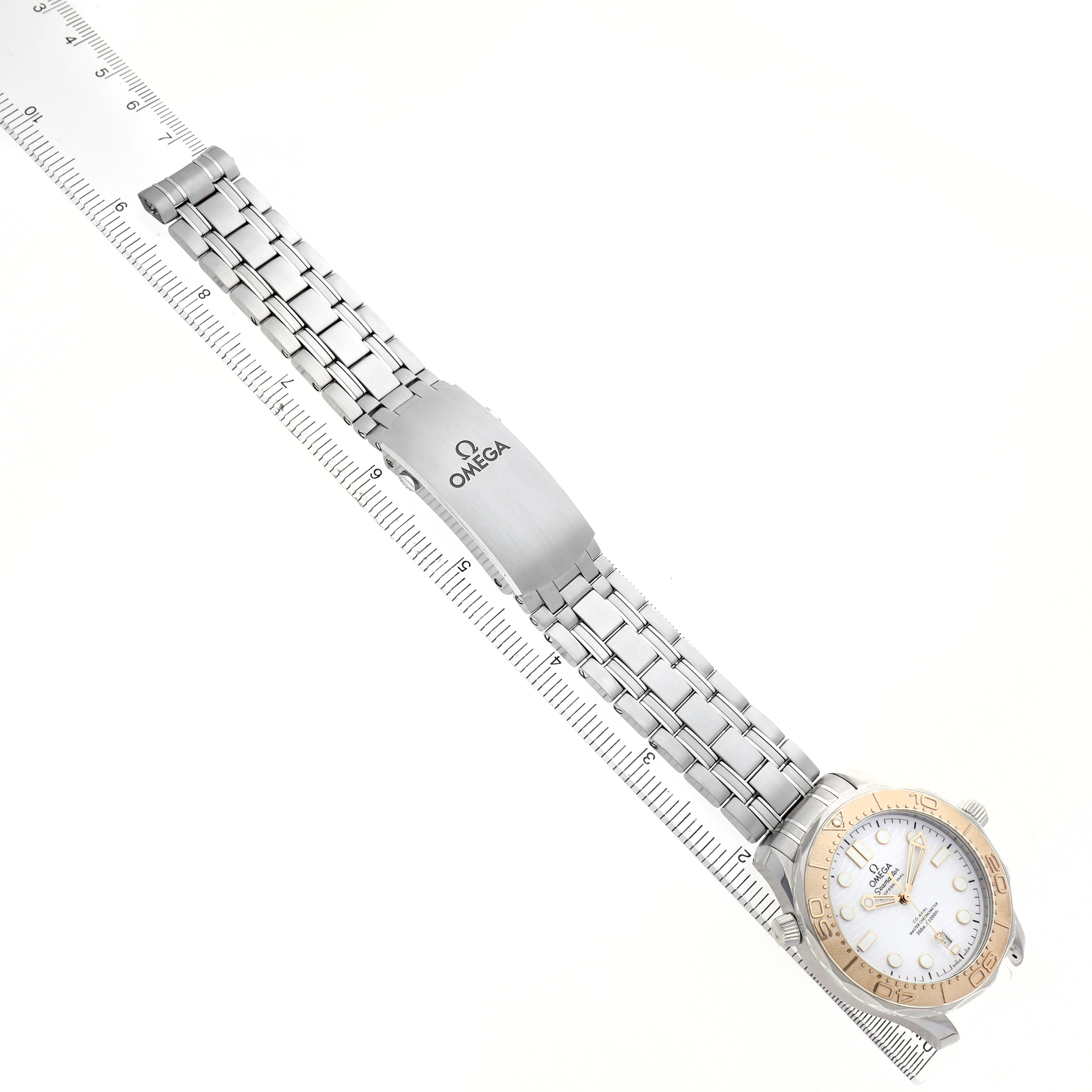 The Omega Seamaster 522.21.42.20.04.001 Men's Steel and Gold (two tone) White Dial watch is shown from the top, displaying the face, bezel, bracelet, and clasp with a visible Omega logo.