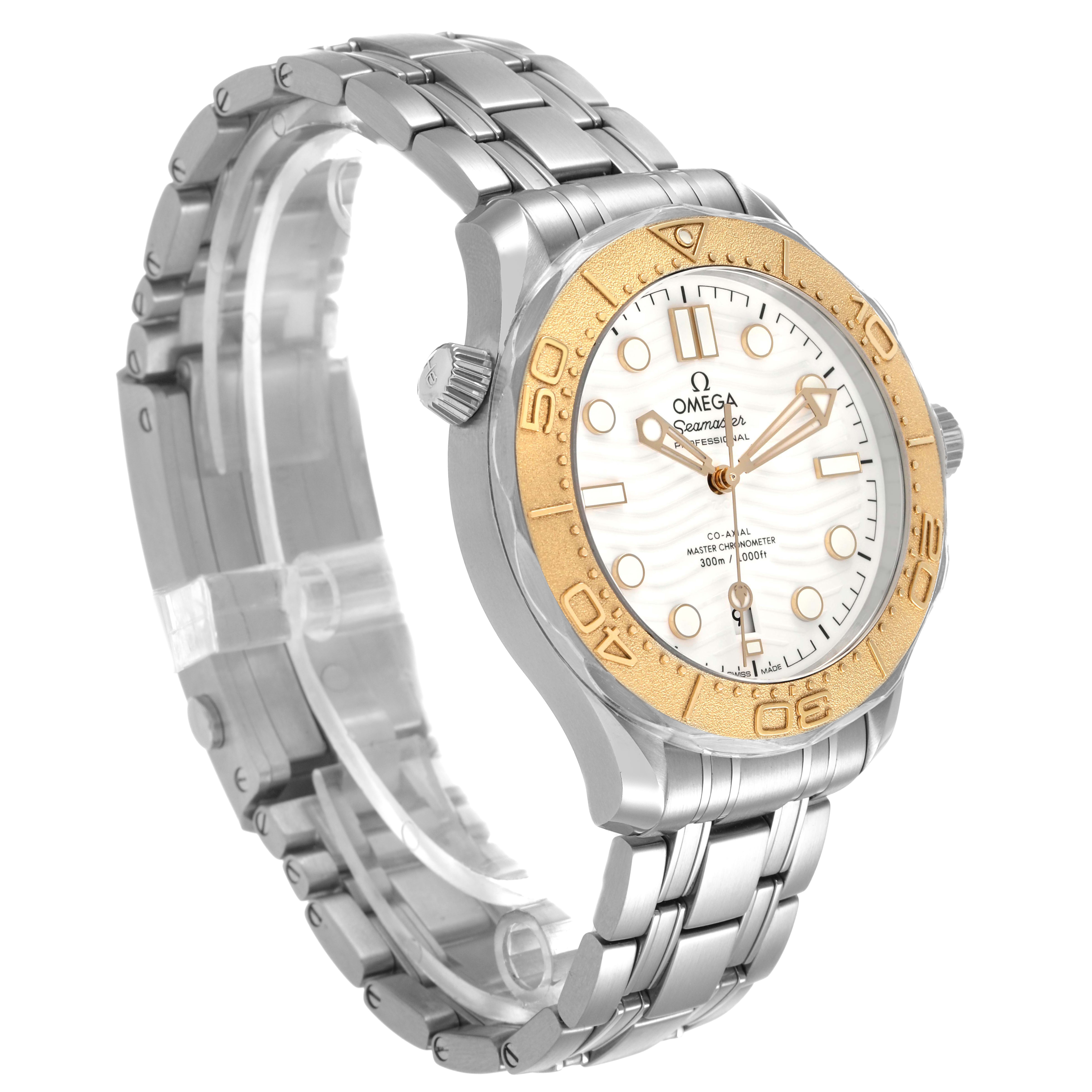The Omega Seamaster 522.21.42.20.04.001 Men's Steel and Gold (two tone) White Dial watch is shown at a three-quarter angle, featuring its bracelet, bezel, and face.