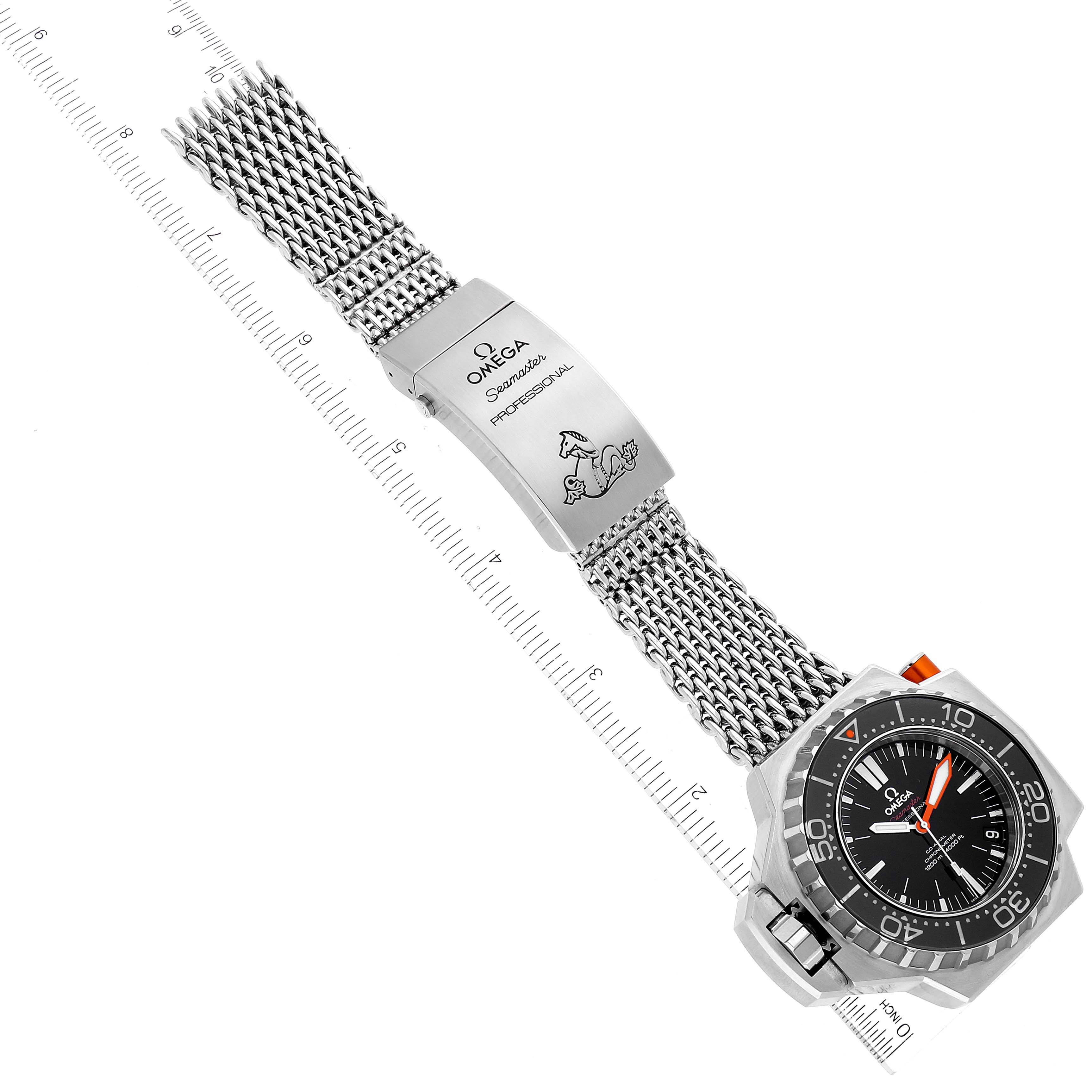 The image shows an Omega Seamaster Ploprof watch at an oblique angle, highlighting the dial, mesh bracelet, and clasp.
