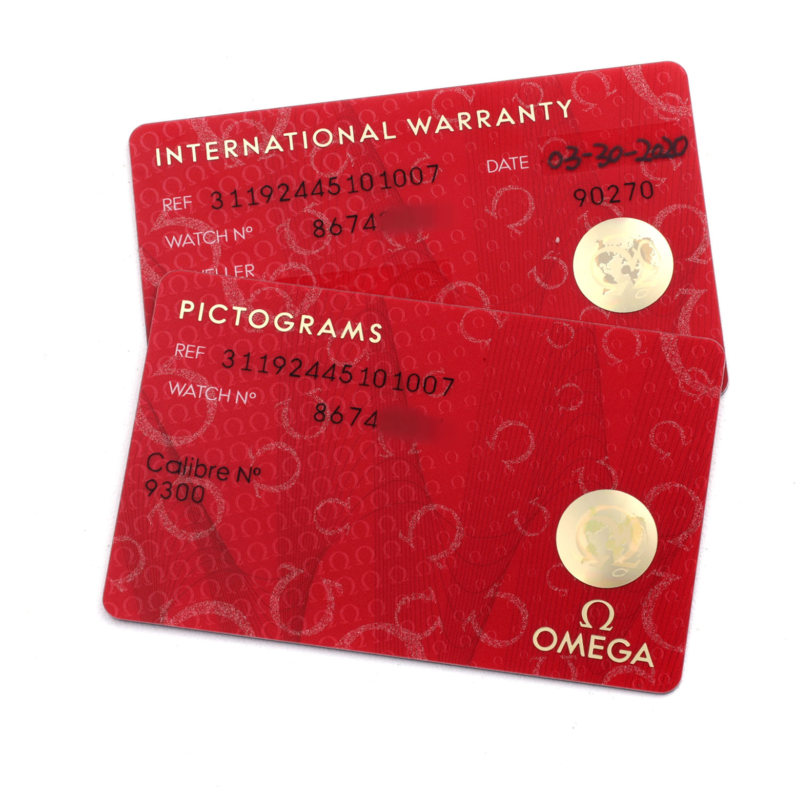 The image shows red International Warranty and Pictograms cards for an Omega Speedmaster 311.92.44.51.01.007 Men's Ceramic Black Dial watch.