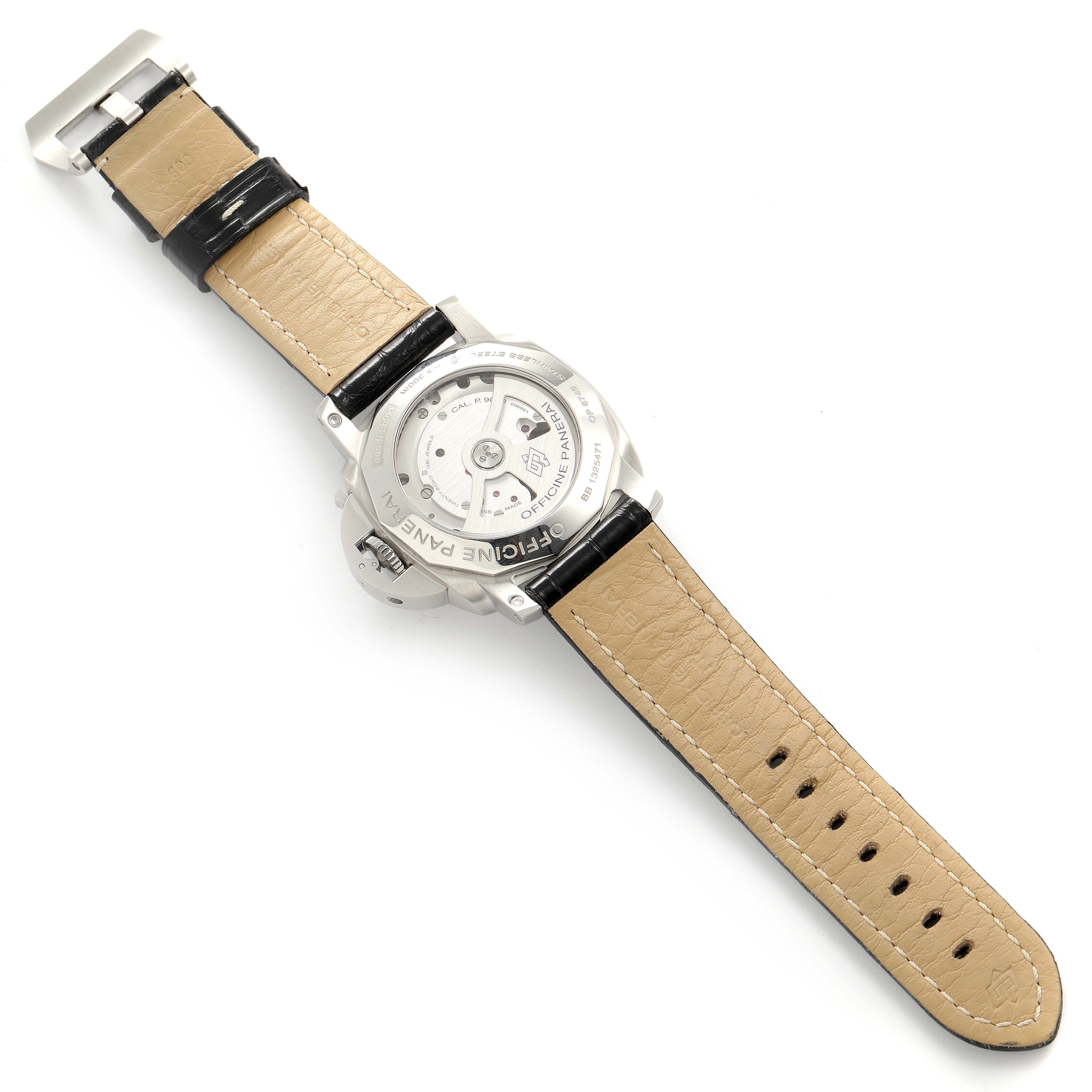 The image shows the back view of a Panerai Luminor PAM00312 Men
s Stainless Steel Black Dial PAM00312 Men
s Stainless Steel Black Dial watch, displaying its case back, movement, and leather strap.