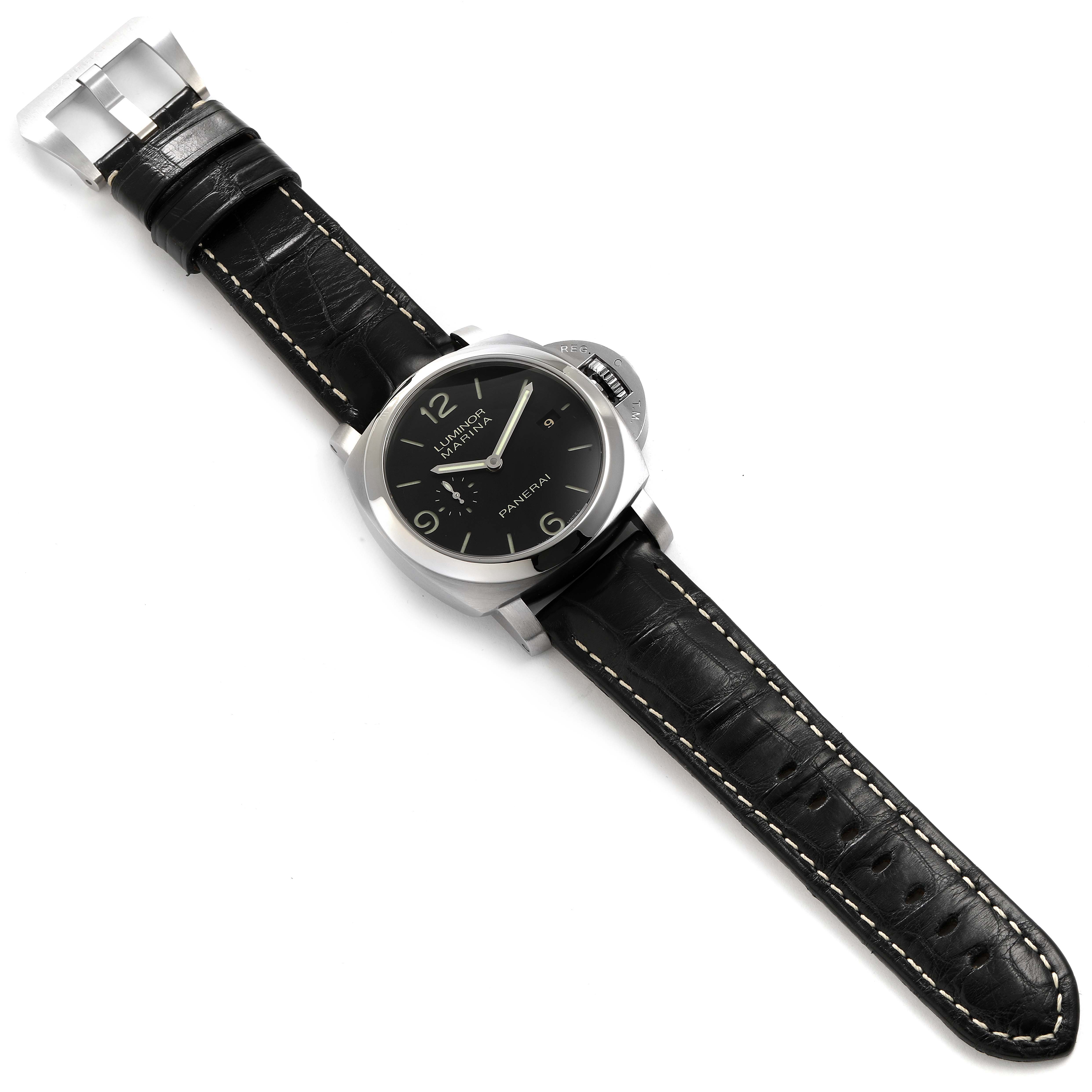 The image shows a top view of a Panerai Luminor PAM00312 Men
s Stainless Steel Black Dial PAM00312 Men
s Stainless Steel Black Dial watch displaying its black leather strap, black dial, and silver casing.