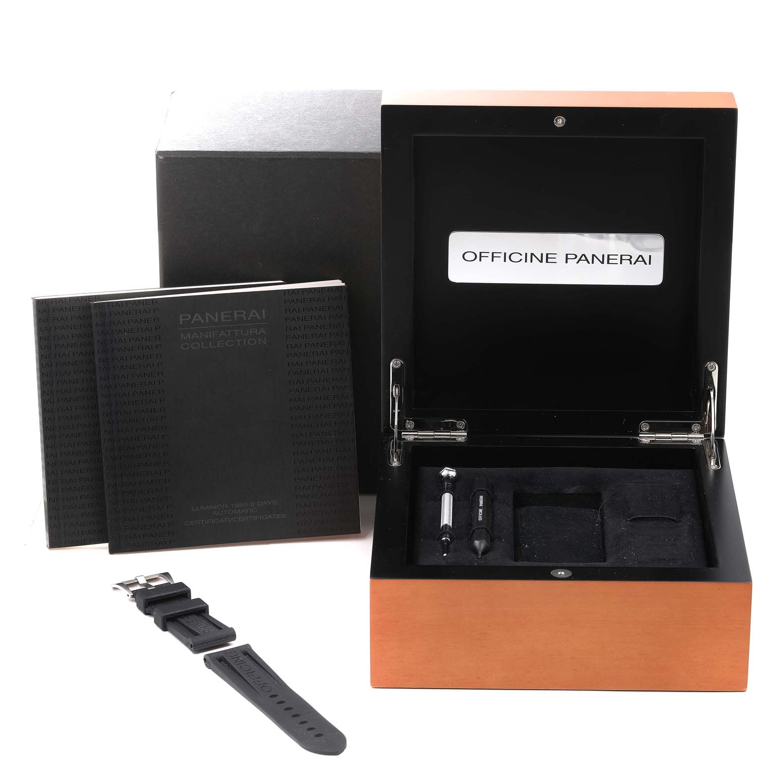 The image shows an open Panerai Luminor PAM00312 Men
s Stainless Steel Black Dial PAM00312 Men
s Stainless Steel Black Dial watch box with manuals, an extra strap, and tools, viewed from the front.