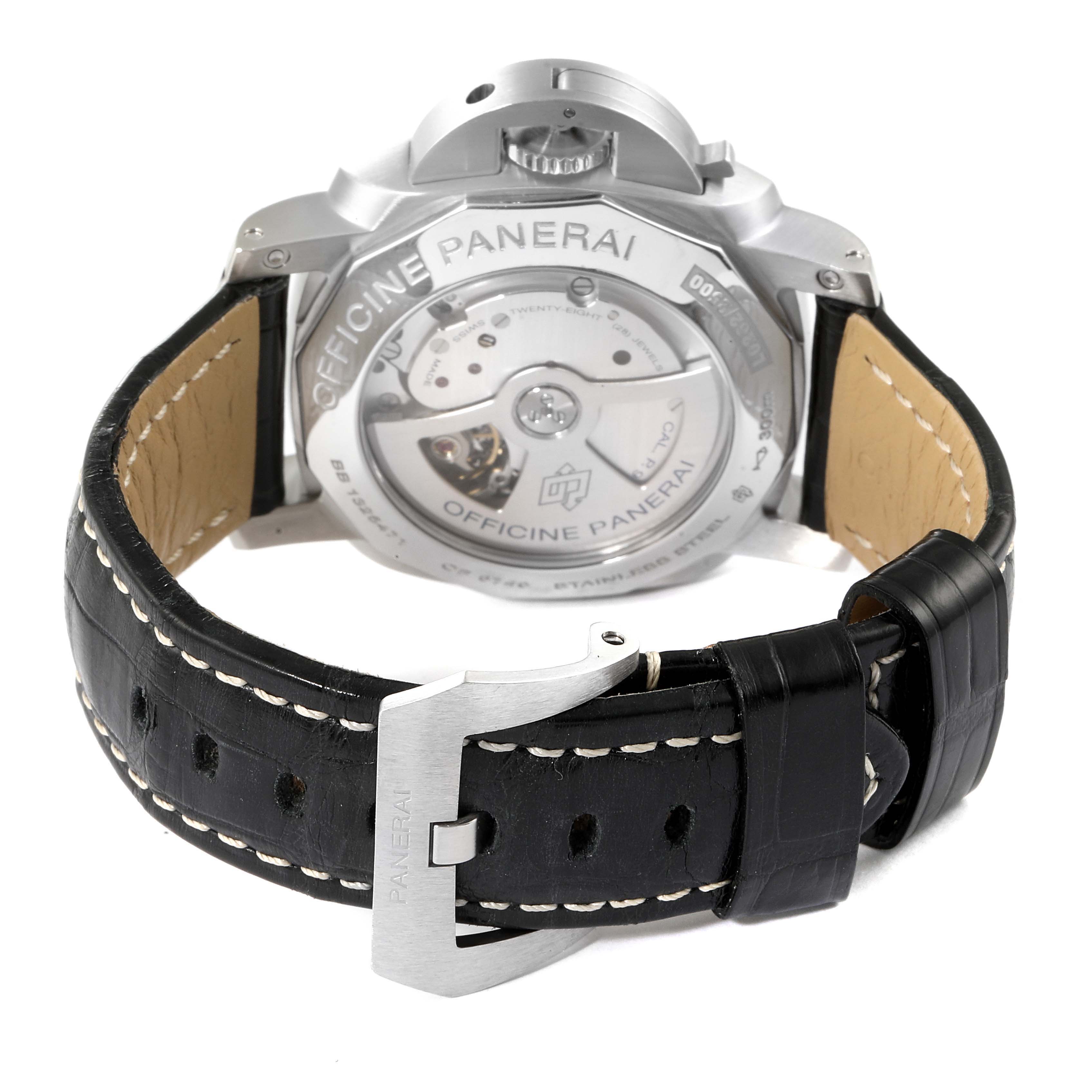 The image shows the rear view of a Panerai Luminor PAM00312 Men
s Stainless Steel Black Dial PAM00312 Men
s Stainless Steel Black Dial watch, highlighting its exposed movement and black leather strap with a buckle.