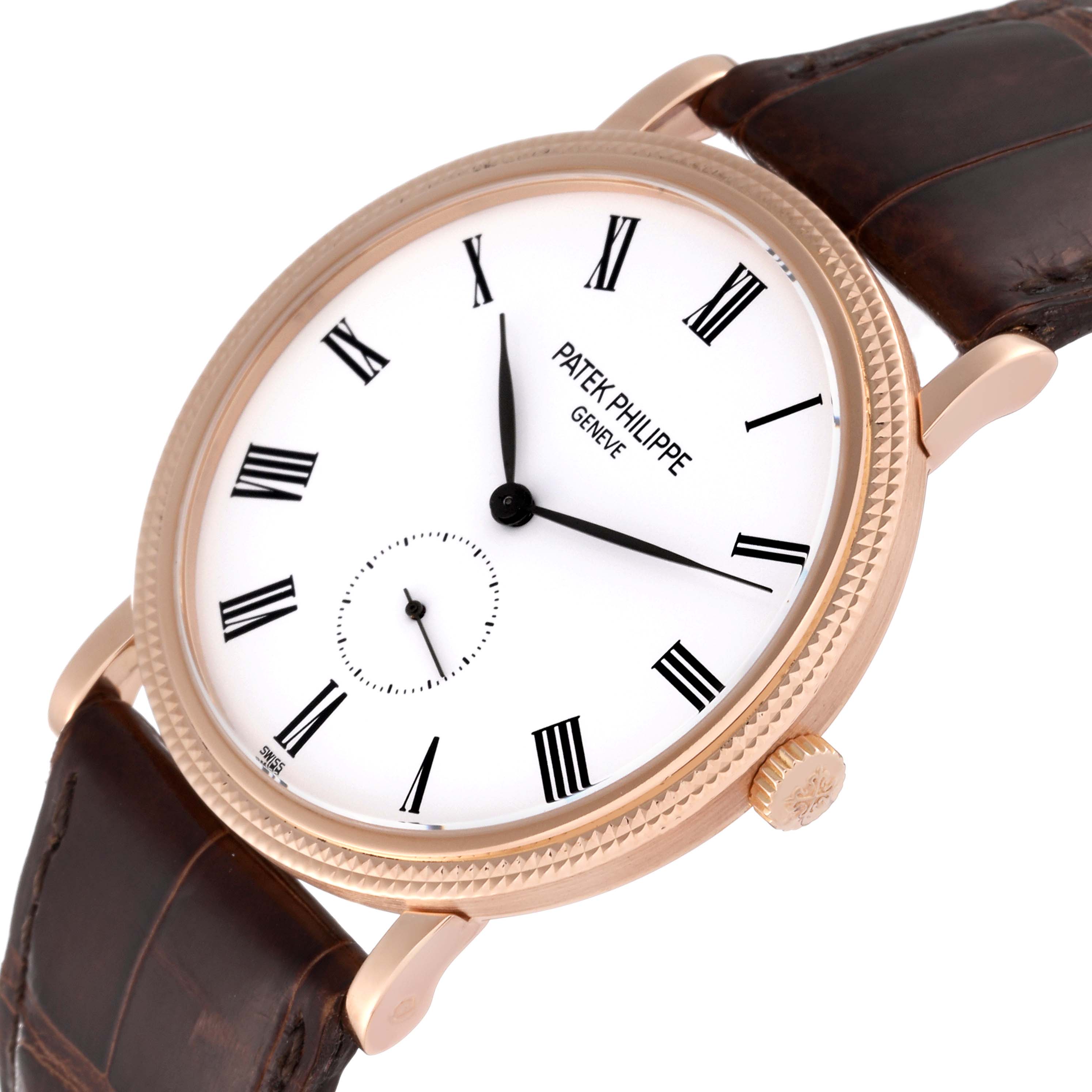 The image shows a Patek Philippe Calatrava 5119R Men
s Rose Gold White Dial 5119R Men
s Rose Gold White Dial watch from a slightly angled top view, highlighting the dial, bezel, crown, and strap.