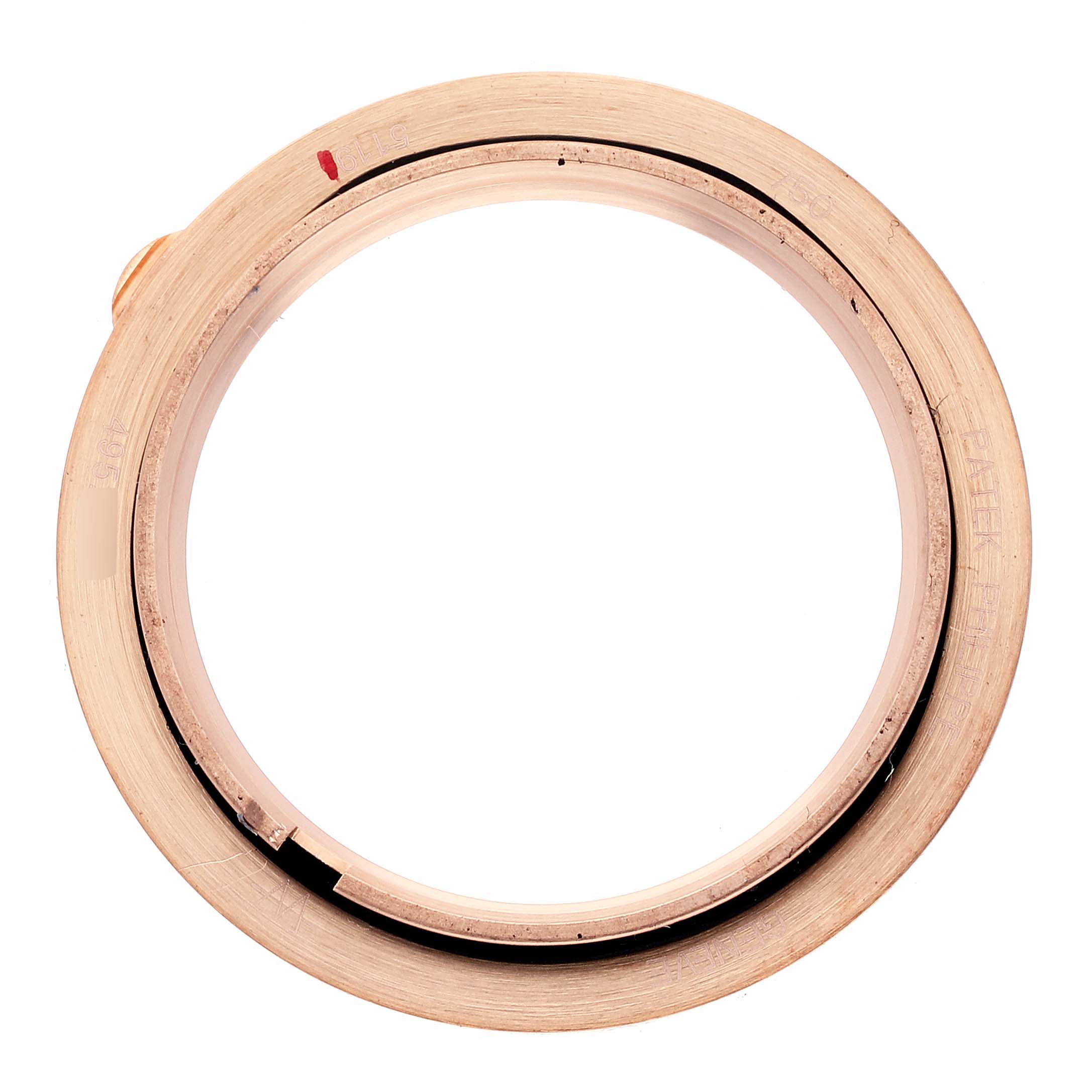 The image shows the watch bezel of a Patek Philippe Calatrava 5119R Men
s Rose Gold White Dial 5119R Men
s Rose Gold White Dial model from a top-down angle.