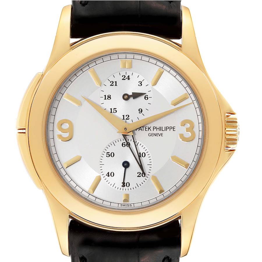 The Patek Philippe Calatrava watch is shown from the front, highlighting its dial, hands, and case.