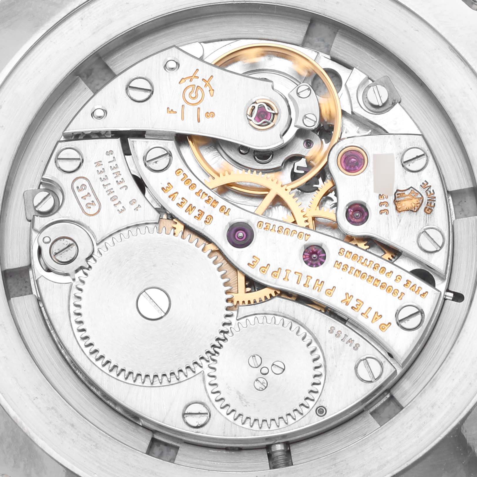 The image shows a close-up of the Patek Philippe Calatrava 5116G Men
s White Gold White Dial 5116G Men
s White Gold White Dial
s inner mechanical movement from a top-down angle.