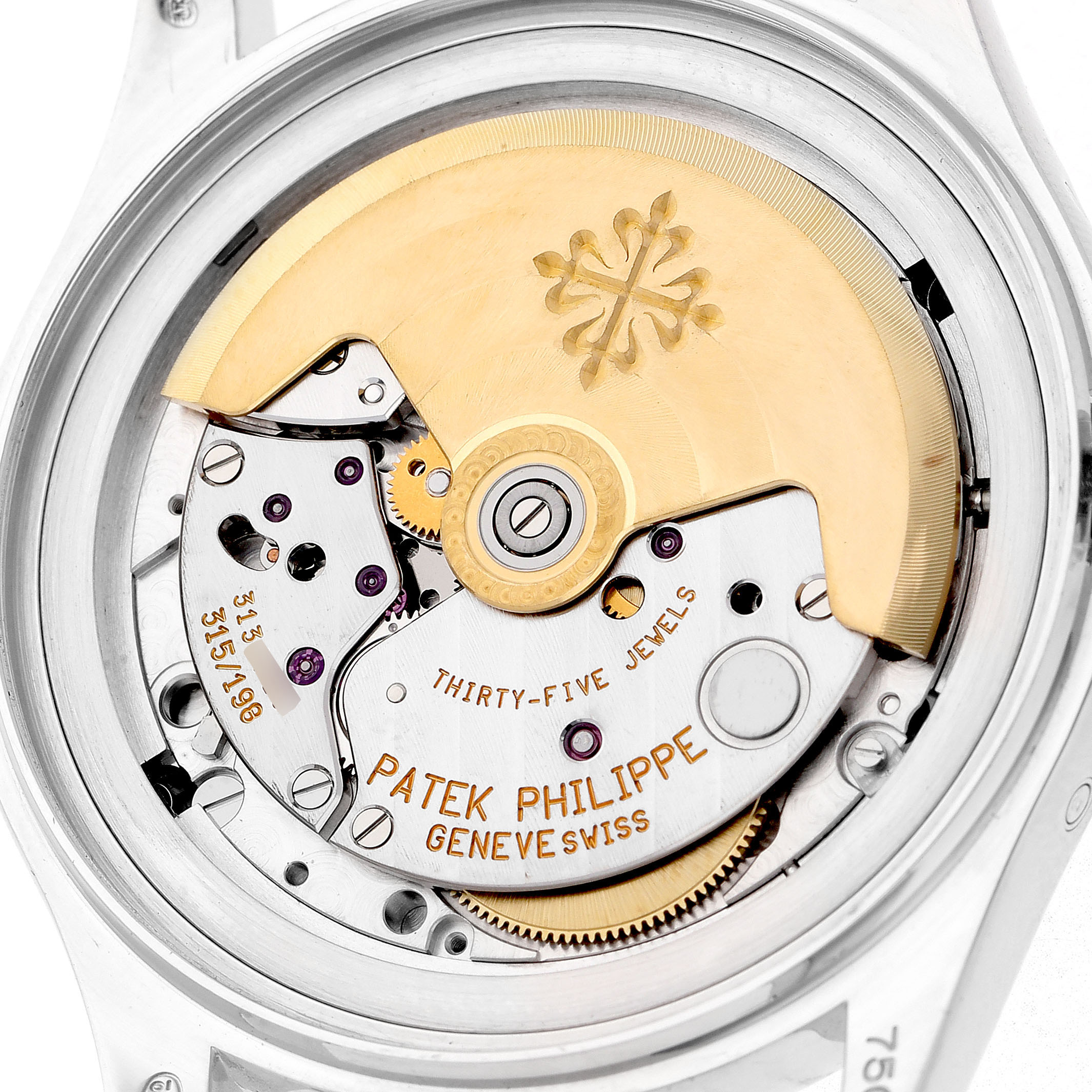 The image shows the back view of a Patek Philippe Complications 5035G-039 Men's White Gold Silver Dial model, highlighting the movement and rotor.