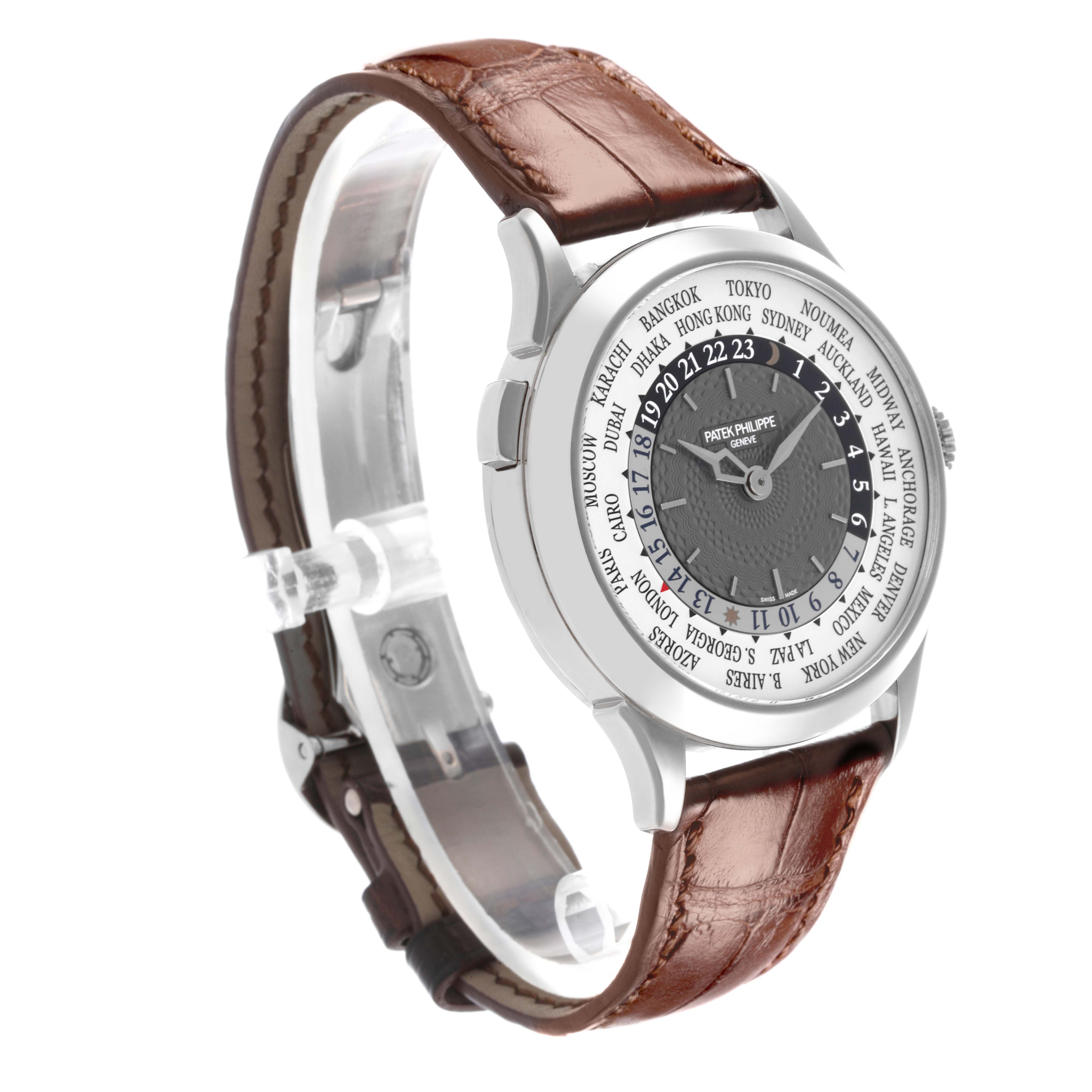 This image shows a side and front view of a Patek Philippe Complications 5230G-001 Men's White Gold Silver Dial 5230G-001 Men's White Gold Silver Dial watch, displaying the dial, bezel, and leather strap.