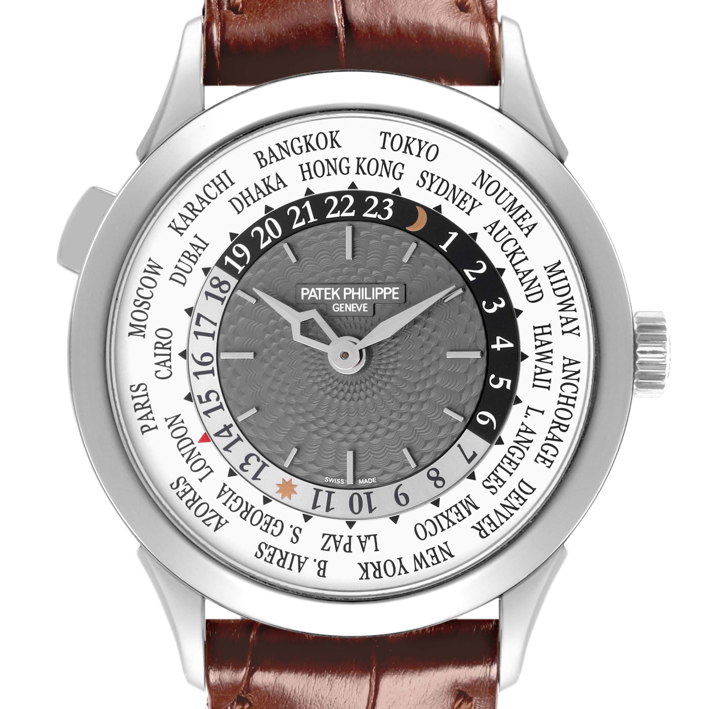 The Patek Philippe Complications 5230G-001 Men's White Gold Silver Dial 5230G-001 Men's White Gold Silver Dial watch is shown from a front angle, displaying the dial, hour markers, and leather strap.