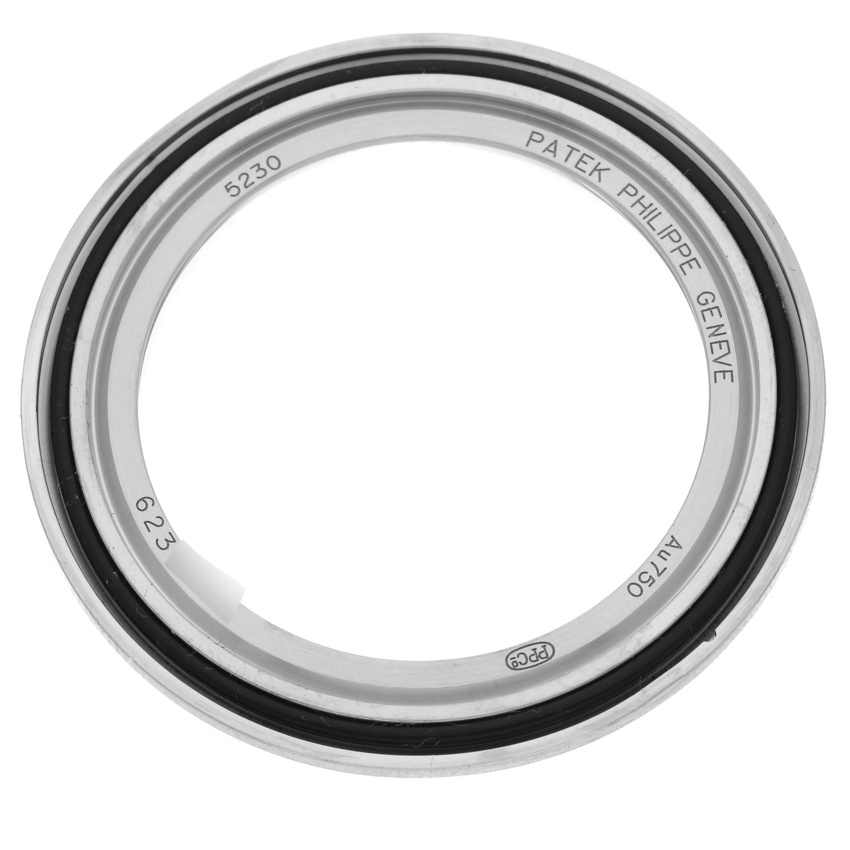 The image shows the bezel of a Patek Philippe Complications 5230G-001 Men's White Gold Silver Dial 5230G-001 Men's White Gold Silver Dial model, viewed from the front.