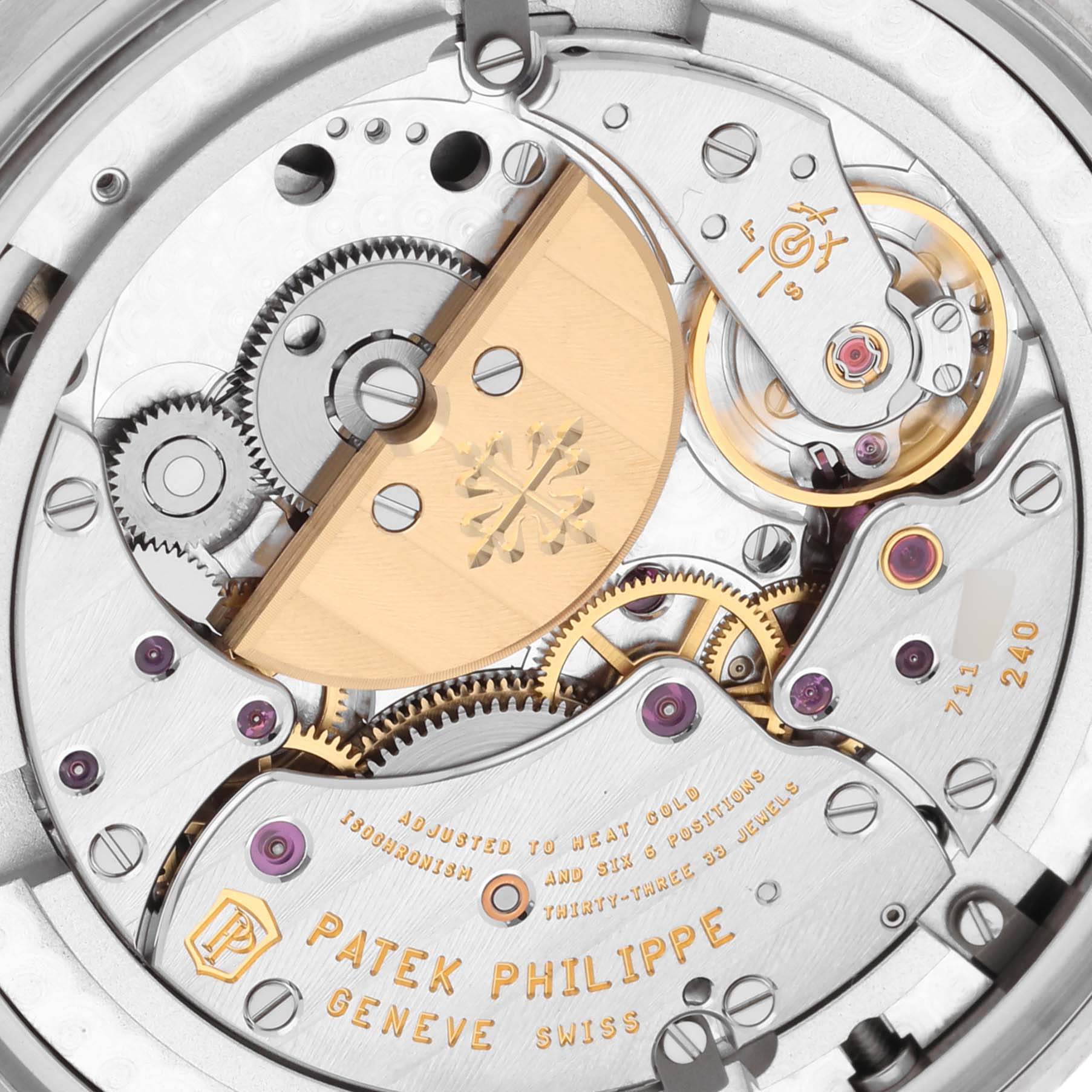 The image shows the intricate back view of the Patek Philippe Complications 5230G-001 Men's White Gold Silver Dial 5230G-001 Men's White Gold Silver Dial watch movement.