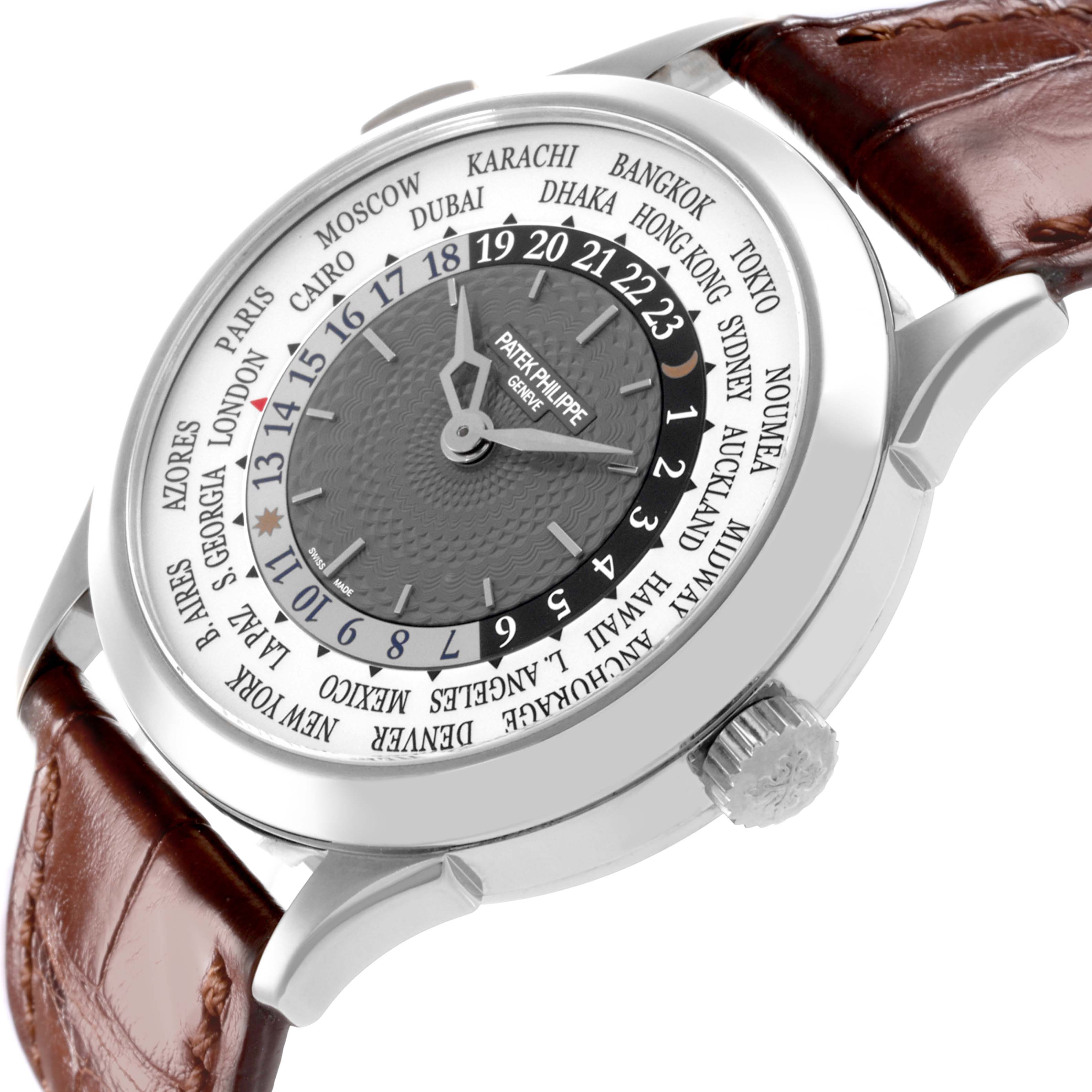 The Patek Philippe Complications 5230G-001 Men's White Gold Silver Dial 5230G-001 Men's White Gold Silver Dial watch is shown from a top angled view, highlighting the dial, bezel, and part of the leather strap.