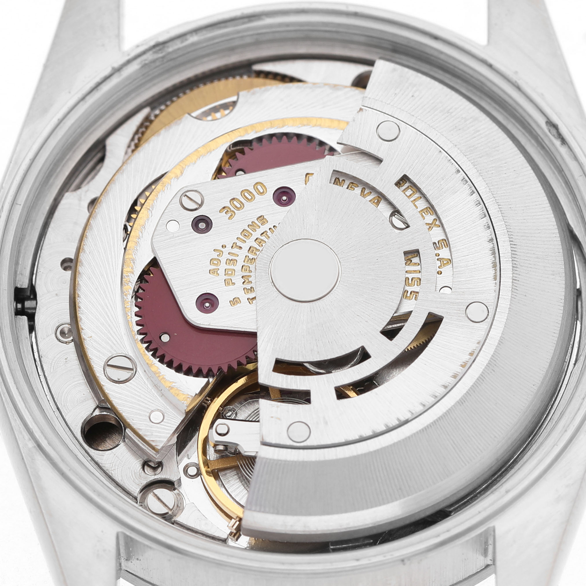 The image shows the movement mechanism from the back of a Rolex Air-King 14000 Men's Stainless Steel Silver Dial watch.