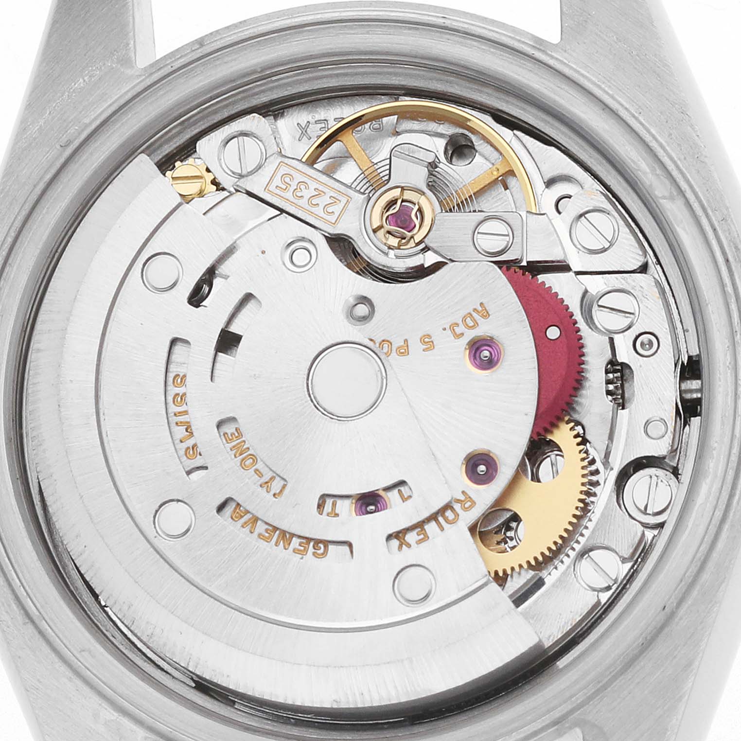 This image shows the movement from the back of a Rolex Date 79190 Women's Stainless Steel Pink Dial model, highlighting gears and components.