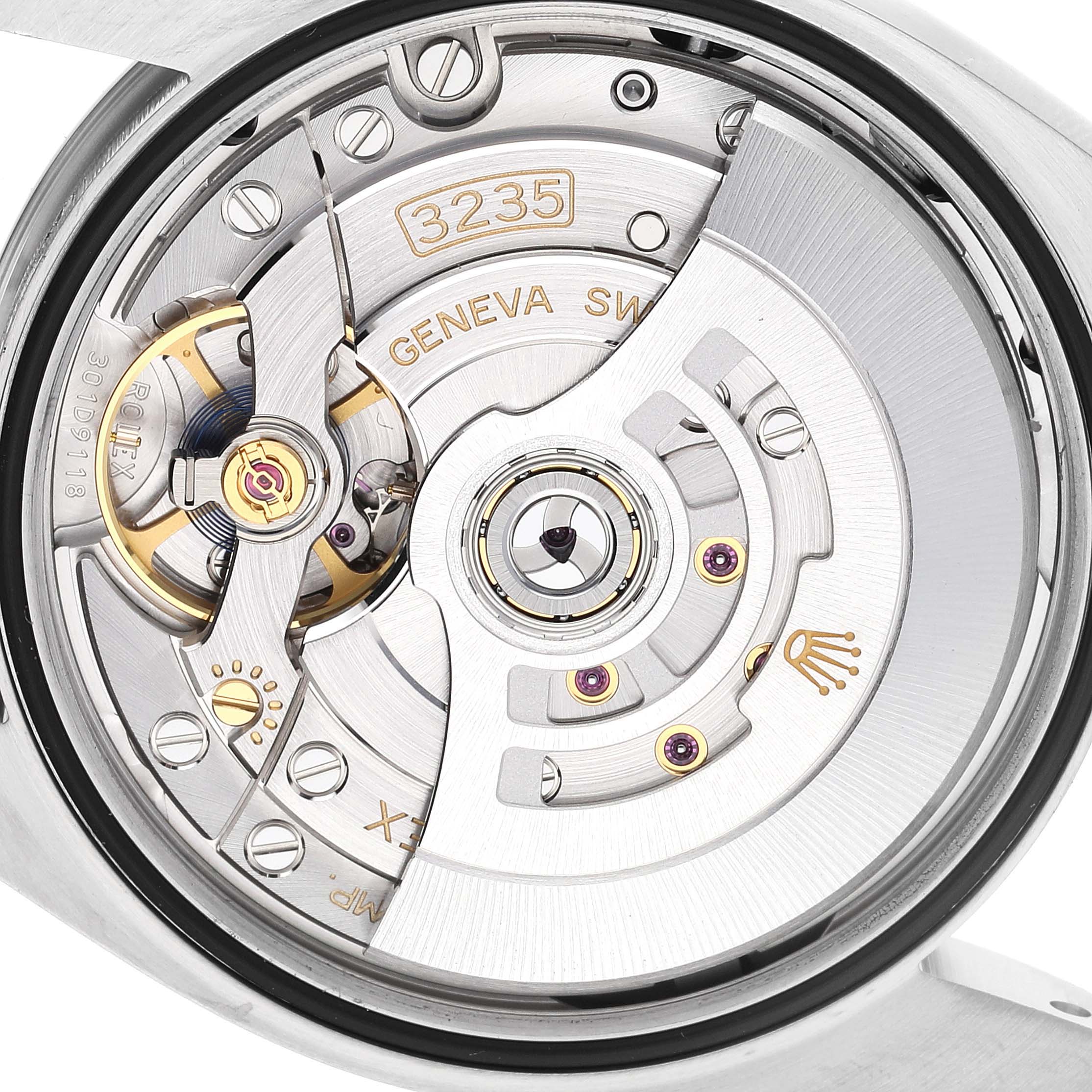 The image shows the movement, specifically the caliber 3235, of a Rolex Datejust 126200 Men's Stainless Steel Silver Dial 126200 Men's Stainless Steel Silver Dial watch from the back.