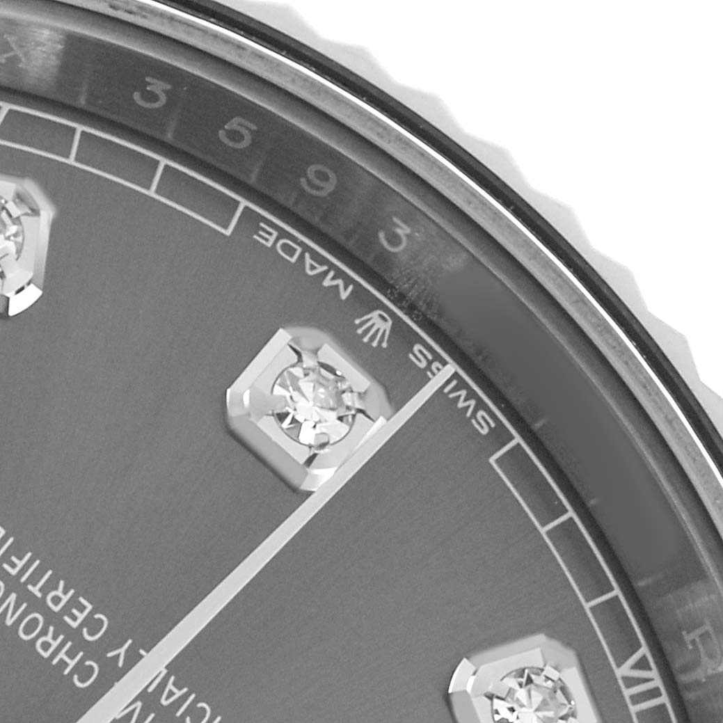 The image shows a close-up of the Rolex Datejust 41 126334 Men's Stainless Steel Grey Dial's dial, highlighting the diamond markers, hands, and part of the bezel.