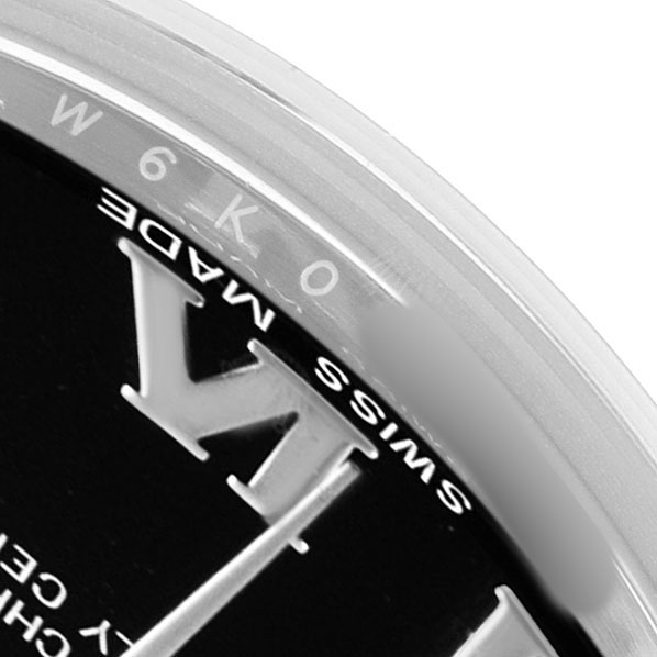 The image shows a close-up of the dial edge and bezel of a Rolex Datejust 178274 Women's Steel and Gold (two tone) Black Dial, featuring parts of the Roman numerals and "Swiss Made" text.