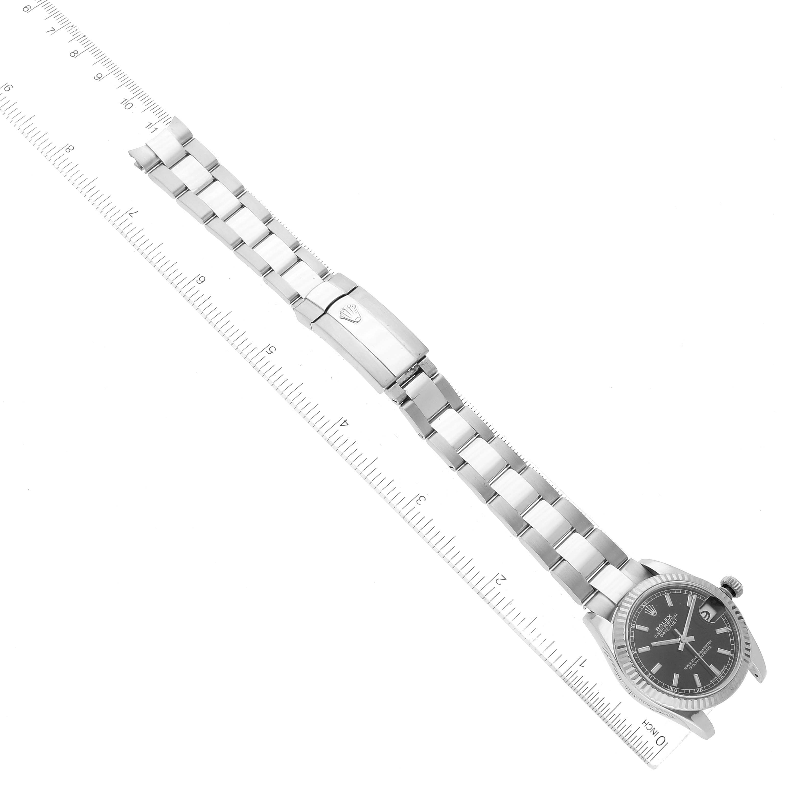 This Rolex Mid-Size 178274 Women's Stainless Steel Black Dial 178274 Women's Stainless Steel Black Dial model watch is shown from a top-down angle, displaying the face, bracelet, and clasp.