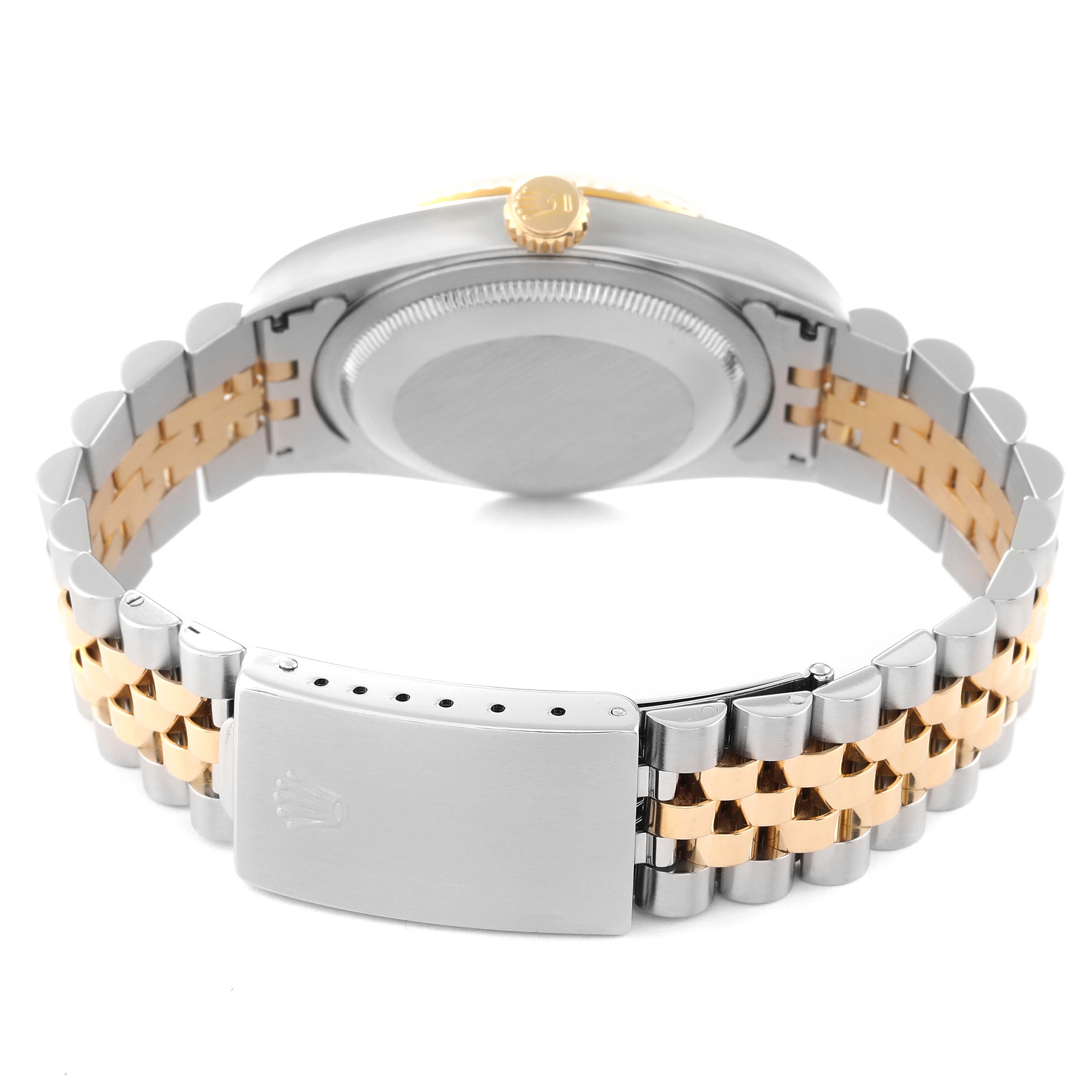 This image shows the back of the Rolex Datejust 16233 Men's Steel and Gold (two tone) Champagne Dial 16233 Men's Steel and Gold (two tone) Champagne Dial watch, focusing on the case back, crown, and bracelet clasp.