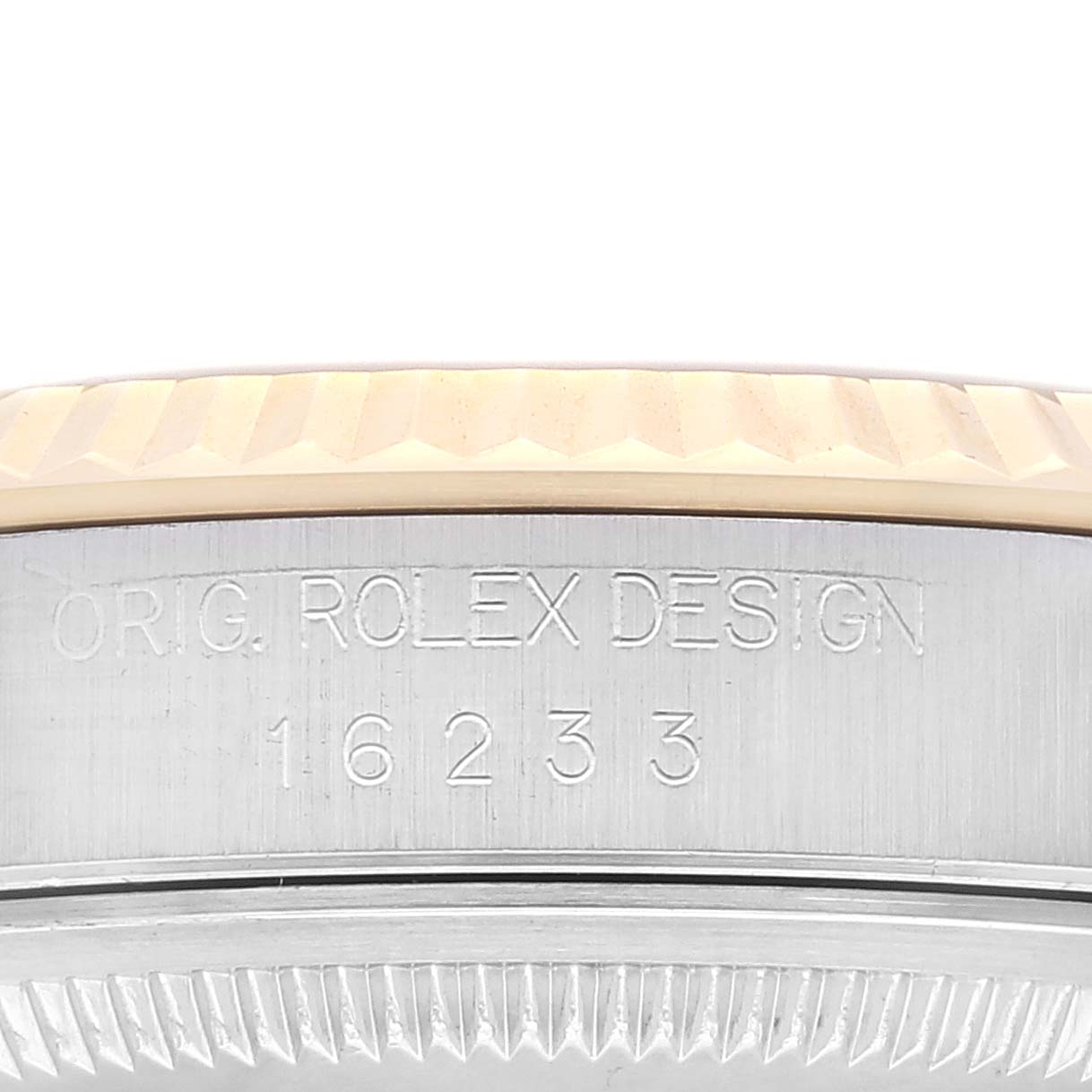 This image shows a detailed close-up of the case side of the Rolex Datejust 16233 Men's Steel and Gold (two tone) Champagne Dial 16233 Men's Steel and Gold (two tone) Champagne Dial, featuring the model number and "ORIG. ROLEX DESIGN" engraving.