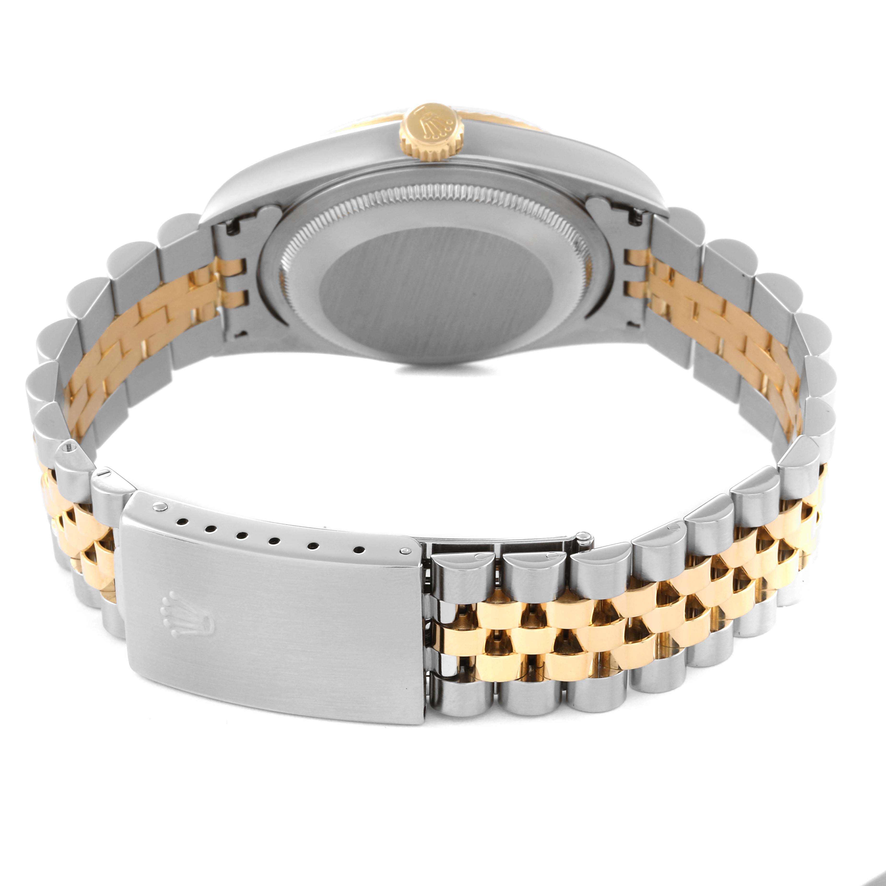 This image shows the back and bracelet of a Rolex Datejust 16233 Men's Steel and Gold (two tone) Champagne Dial 16233 Men's Steel and Gold (two tone) Champagne Dial watch, highlighting its two-tone design and clasp.