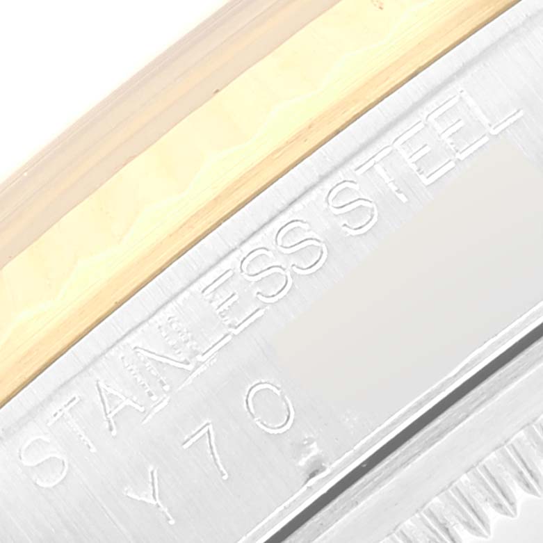 The image shows a close-up of the outer rim of a Rolex Datejust 16233 Men's Steel and Gold (two tone) Champagne Dial 16233 Men's Steel and Gold (two tone) Champagne Dial, highlighting the "STAINLESS STEEL" engraving.