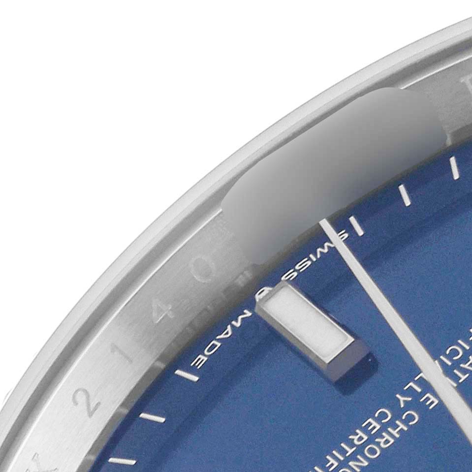 This close-up image shows a portion of the dial and bezel of a Rolex Datejust 126234 Men
s Stainless Steel Blue Dial 126234 Men
s Stainless Steel Blue Dial watch, prominently featuring the blue dial and part of the hour marker.