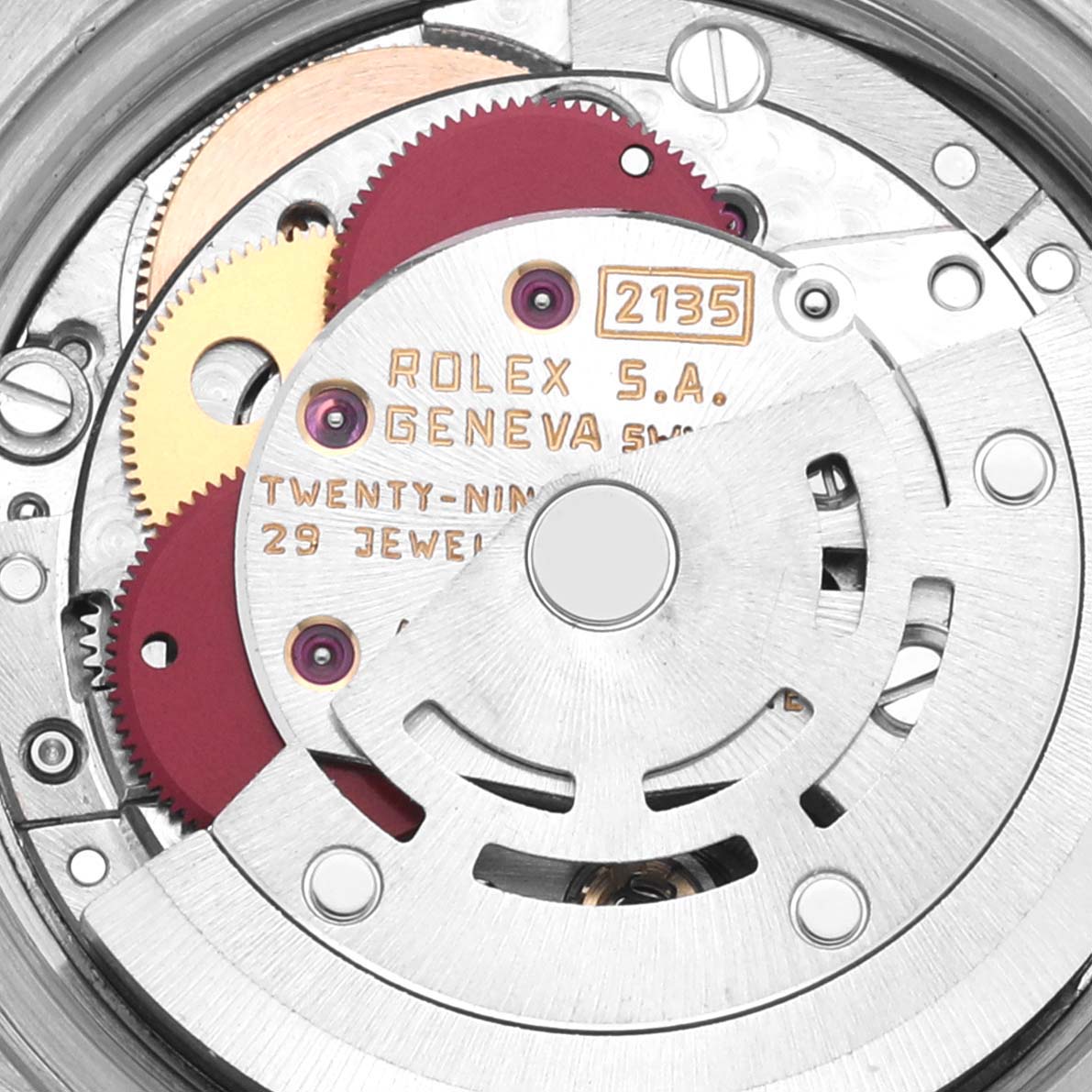 The image shows the movement mechanism of a Rolex Datejust 69174 Women's Stainless Steel Blue Dial 69174 Women's Stainless Steel Blue Dial, highlighting gears and inscriptions from a top view.