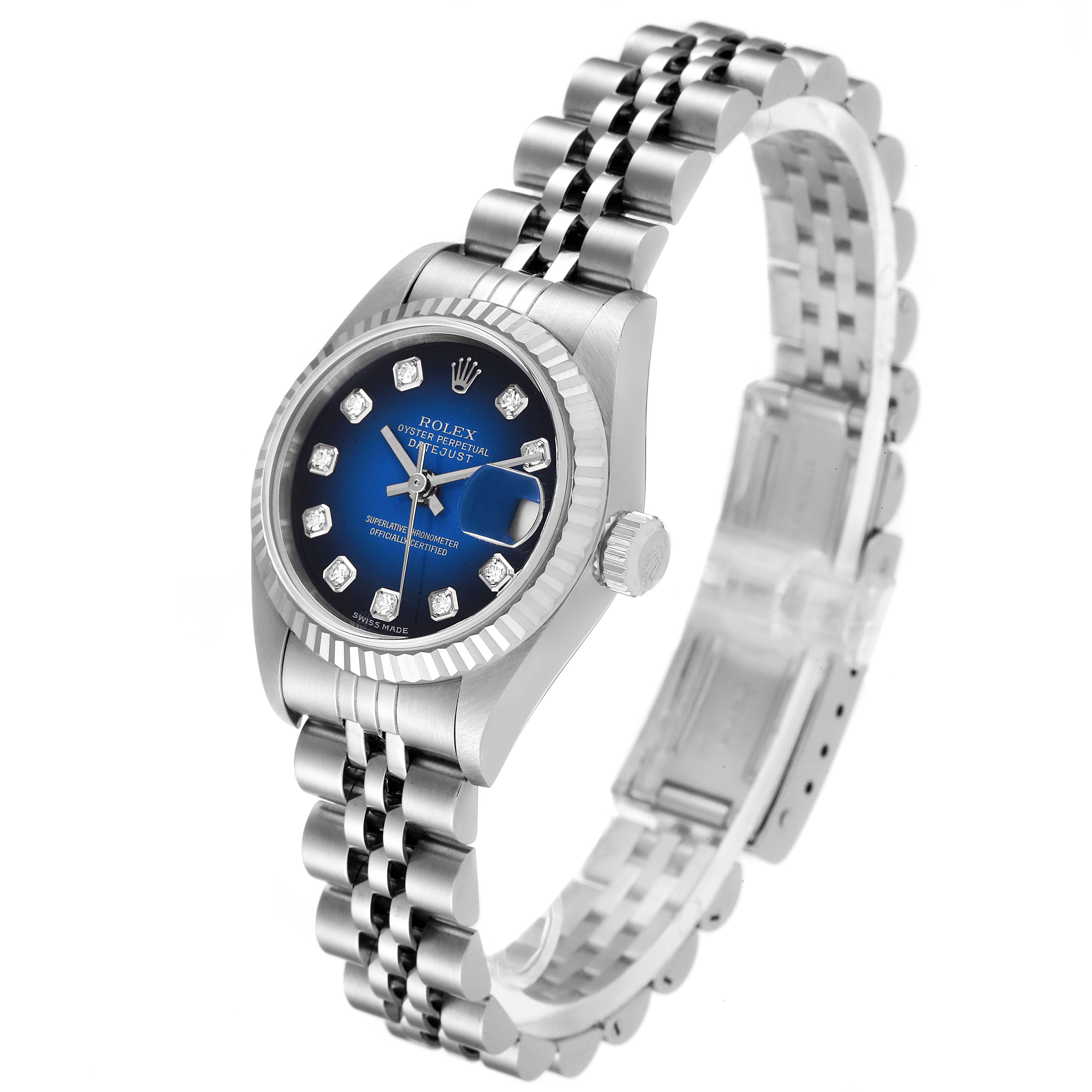 The Rolex Datejust 79174 Women's Stainless Steel Blue Dial 79174 Women's Stainless Steel Blue Dial model is shown from an angled top-down view, highlighting the dial, fluted bezel, and jubilee bracelet.