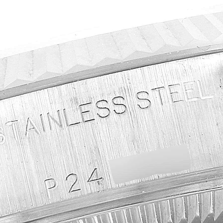 This image shows a close-up angle of the stainless steel casing of a Rolex Datejust 79174 Women's Stainless Steel Blue Dial 79174 Women's Stainless Steel Blue Dial watch.