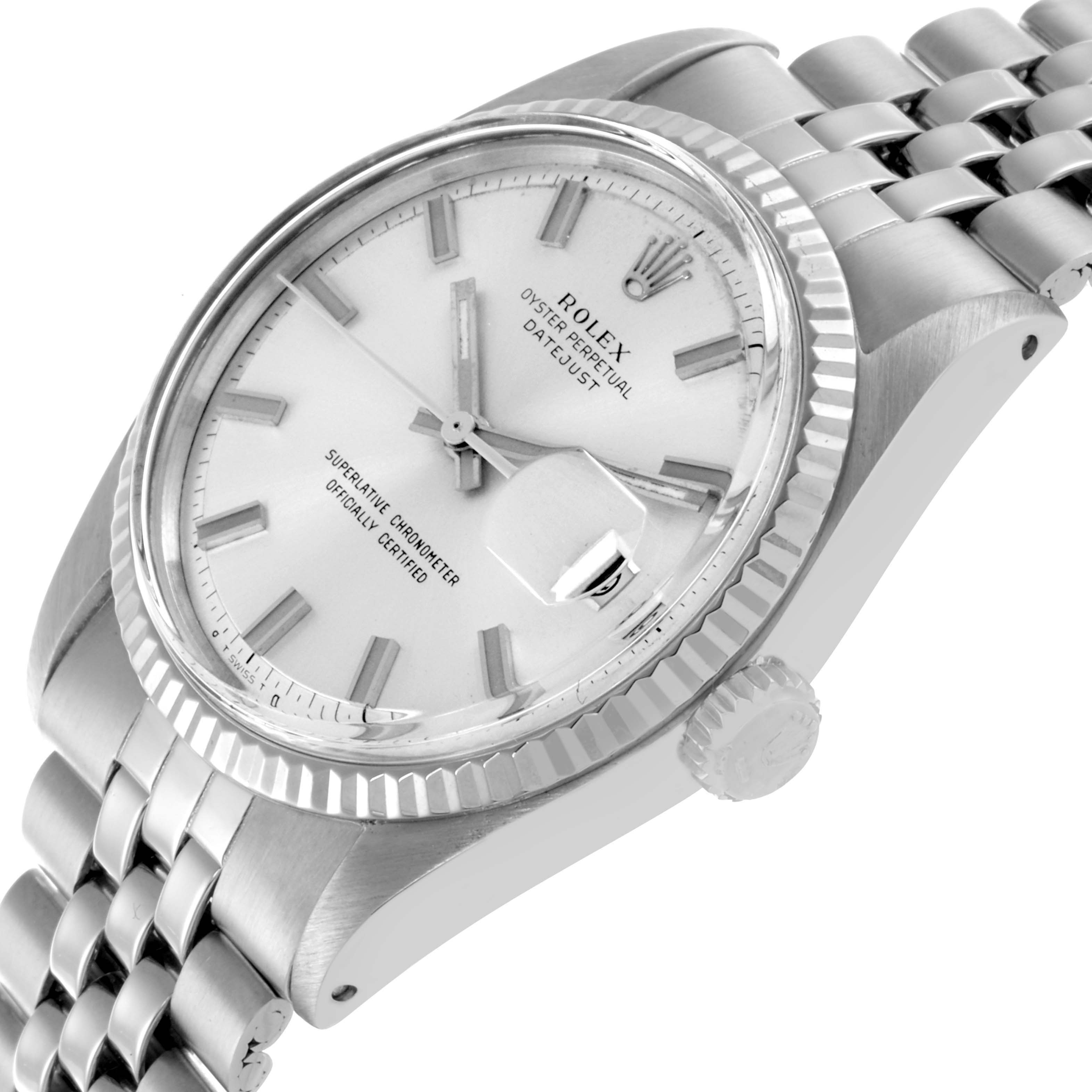 The Vintage Collection Rolex watch is shown at a three-quarter angle, highlighting the face, bezel, crown, and part of the bracelet.