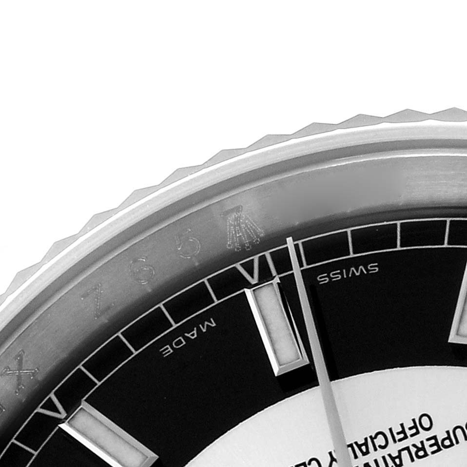 The image shows a close-up of the bezel, dial, and part of the hands of the Rolex Datejust 116234 Men
s Stainless Steel Black Dial 116234 Men
s Stainless Steel Black Dial watch.