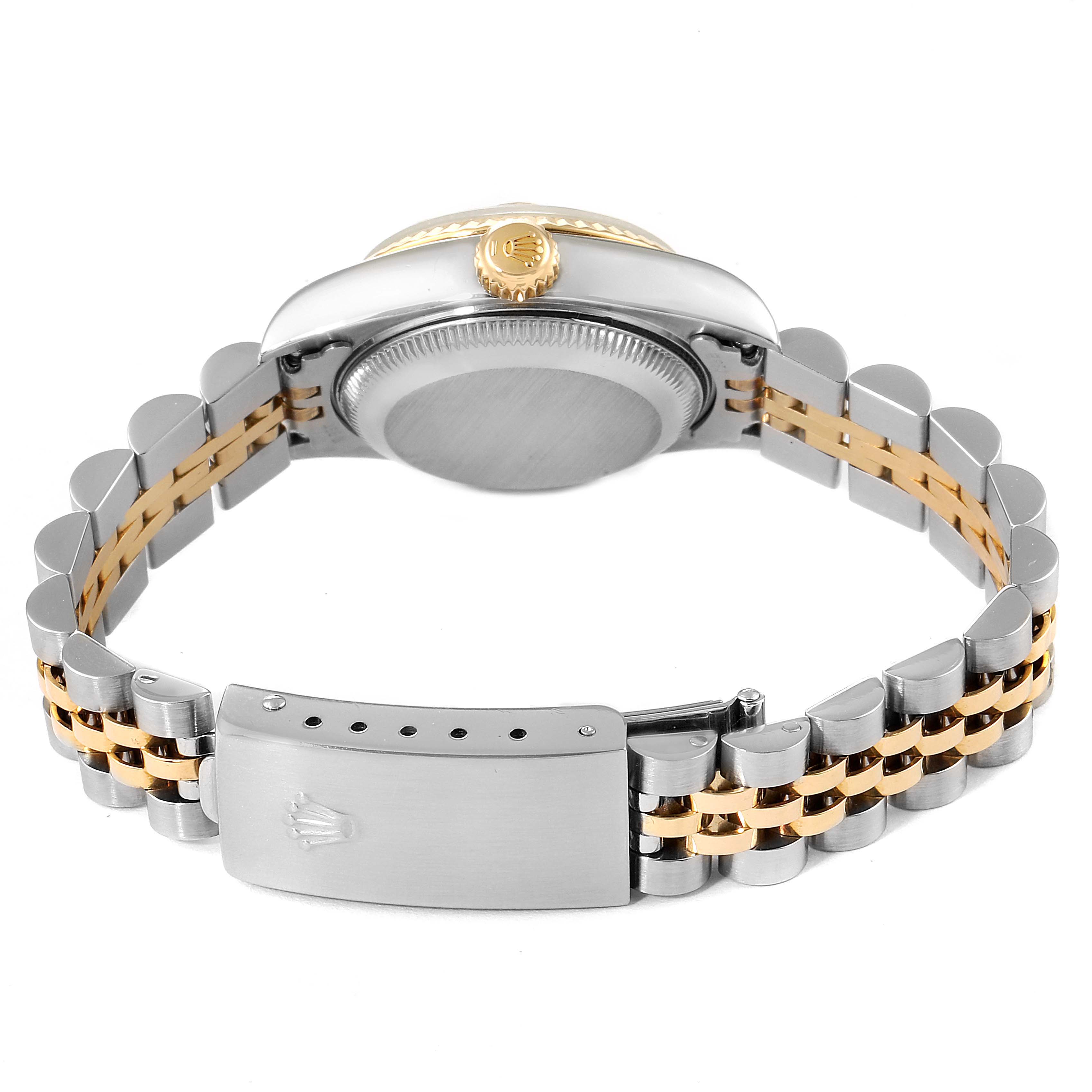 The image shows the back view of a Rolex Datejust 79173 Women's Steel and Gold (two tone) Champagne Dial 79173 Women's Steel and Gold (two tone) Champagne Dial watch, highlighting the clasp, crown, and two-tone bracelet.