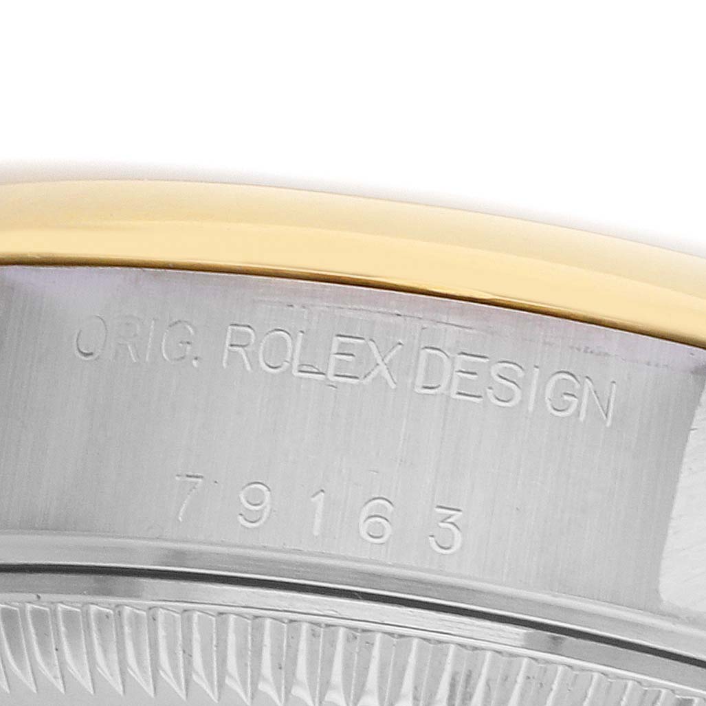 The image shows the side of a Rolex Datejust 79163 Women's Steel and Gold (two tone) Silver Dial watch, highlighting the engraved model number and "Orig. Rolex Design" inscription.