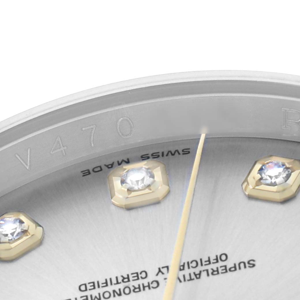 The image shows a close-up of the dial's edge and diamond hour markers on a Rolex Datejust 116233 Men's Steel and Gold (two tone) Silver Dial watch, including part of the rehaut.