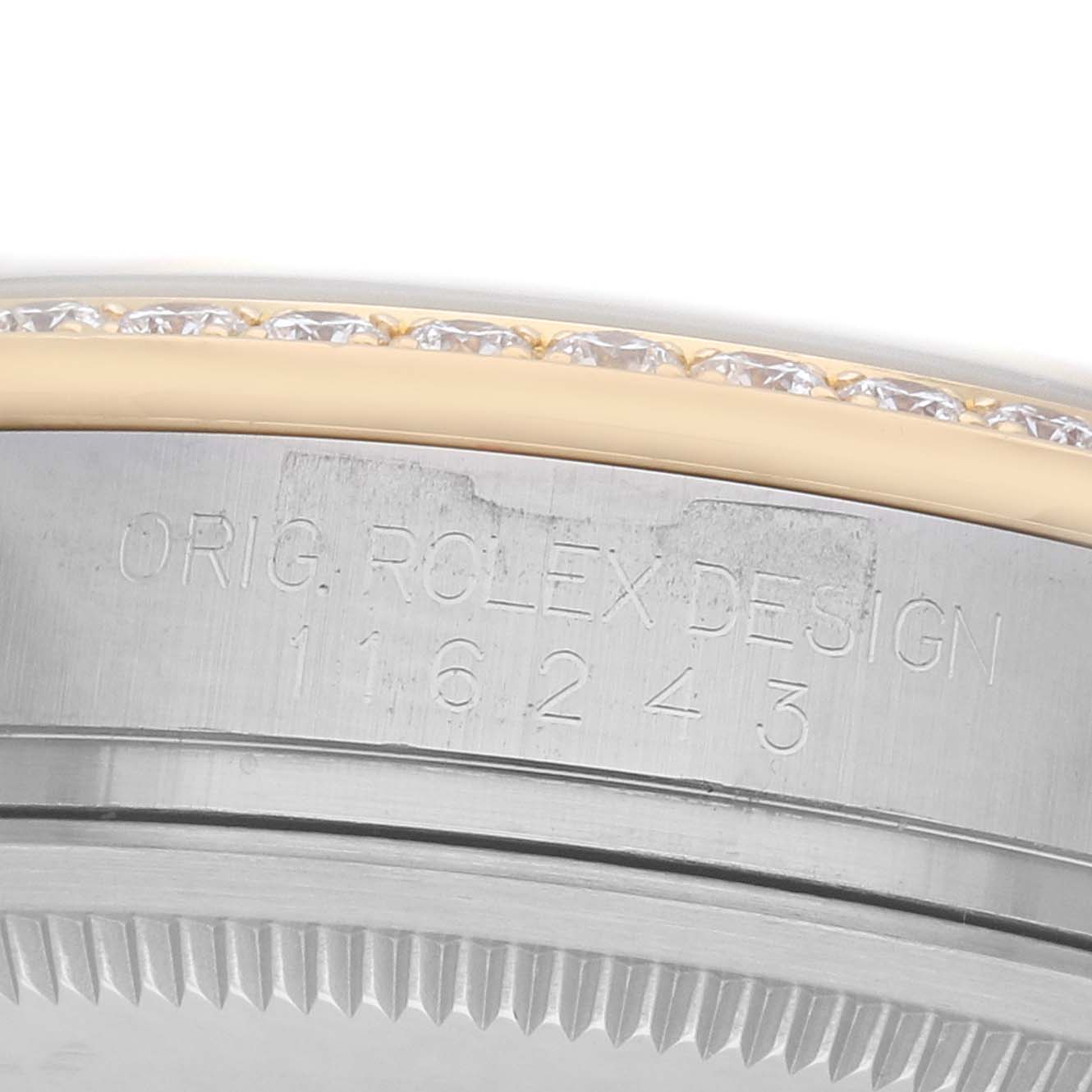 The image shows a close-up of the Rolex Datejust 116243 Men's Steel and Gold (two tone) Silver Dial case side, displaying the model number engraving and part of the bezel with stones.