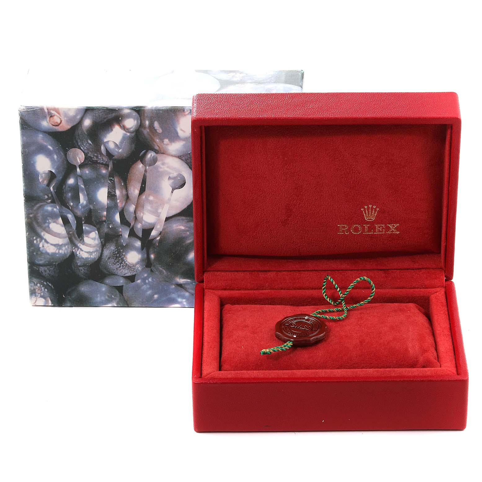 This image shows an empty Rolex Datejust 79173 Women's Stainless Steel White Dial 79173 Women's Stainless Steel White Dial watch box with a red interior and the Rolex seal, alongside an outer decorative box.