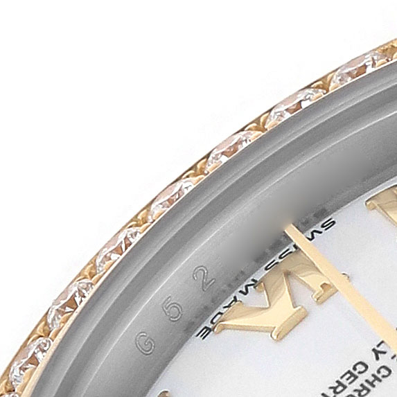 The image shows a close-up of a Rolex Datejust 179383 Women's Steel and Gold (two tone) White Dial watch, focusing on the bezel with diamonds and part of the dial with text.