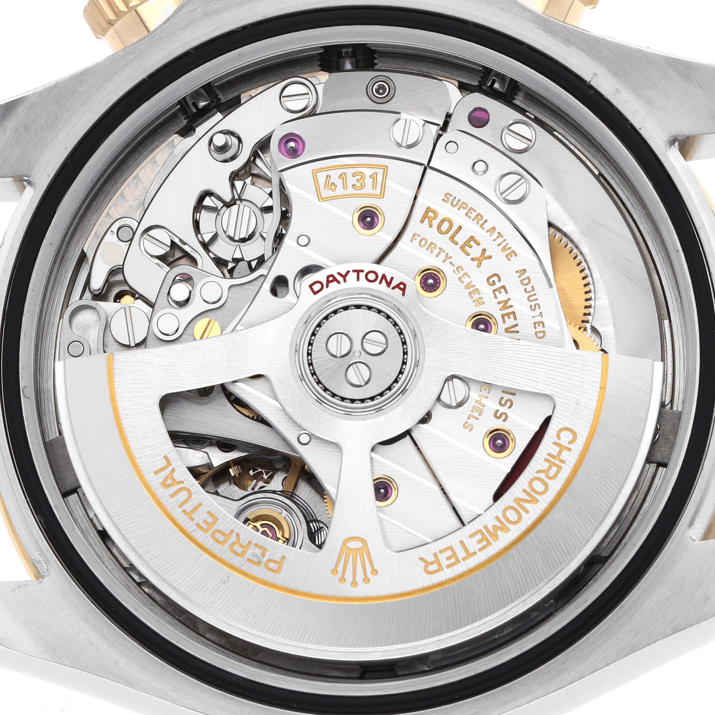 The image shows the back view of a Rolex Daytona 126503 Men's Steel and Gold (two tone) Black Dial, focusing on its intricate movement and rotor.