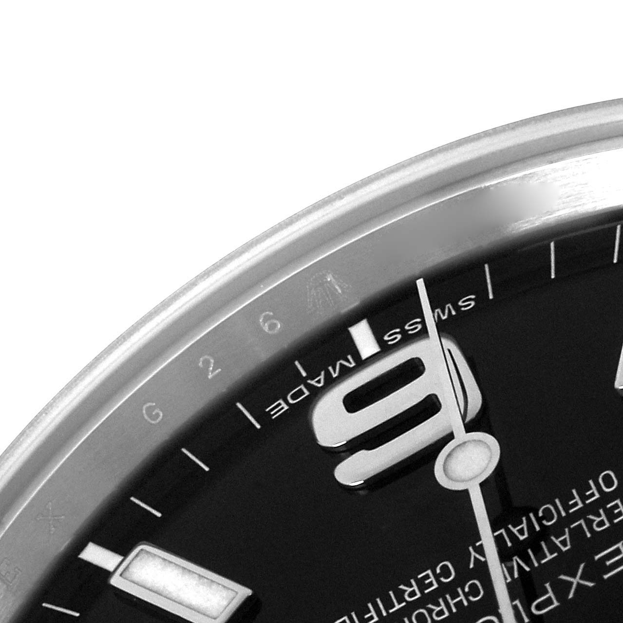 The image shows a partial close-up of the dial of a Rolex Explorer 214270 Men
s Stainless Steel Black Dial 214270 Men
s Stainless Steel Black Dial watch, focusing on the 9 o
clock position and the Swiss Made marking.