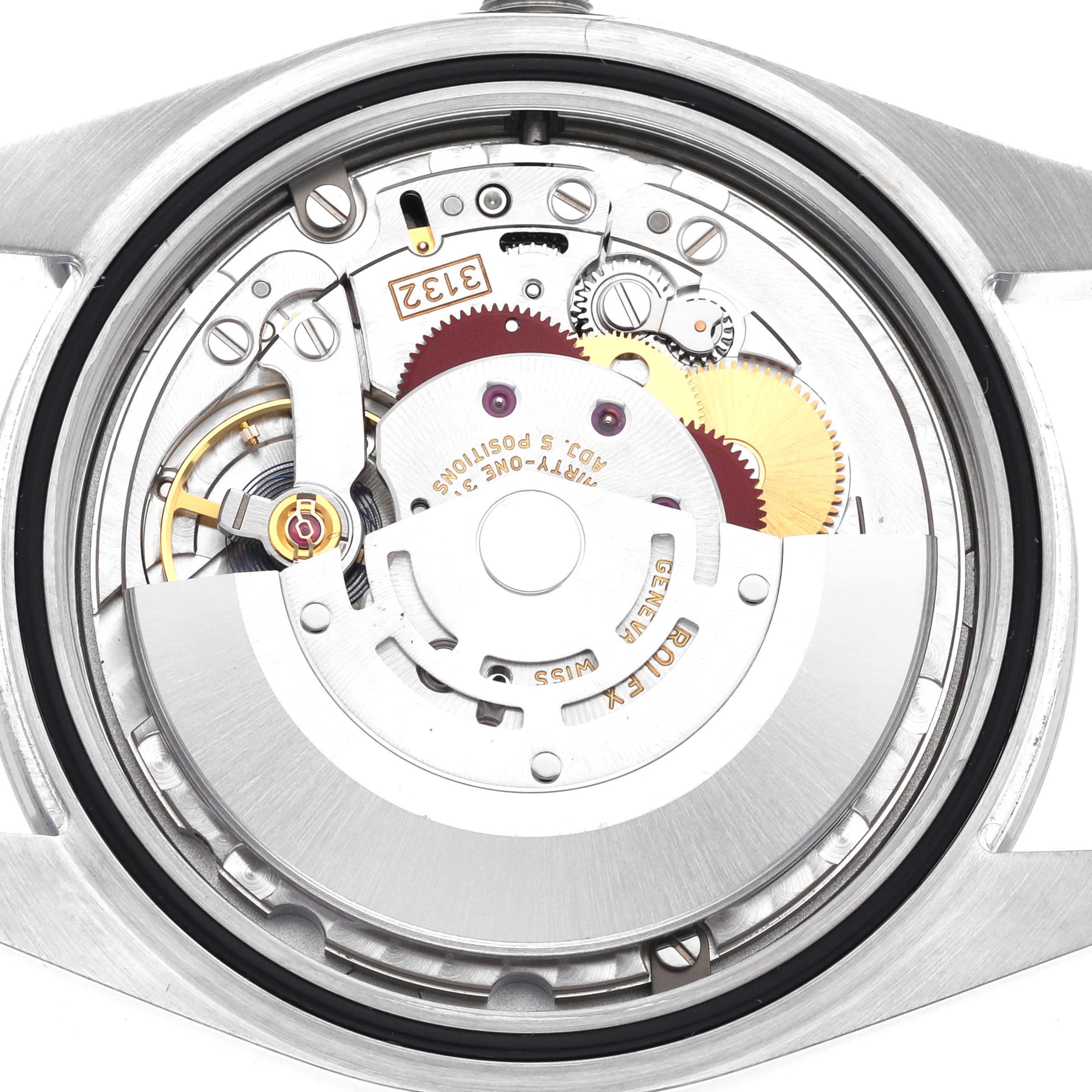 The image shows the internal mechanism of the Rolex Explorer 214270 Men
s Stainless Steel Black Dial 214270 Men
s Stainless Steel Black Dial watch from a rear angle, displaying gears and components.