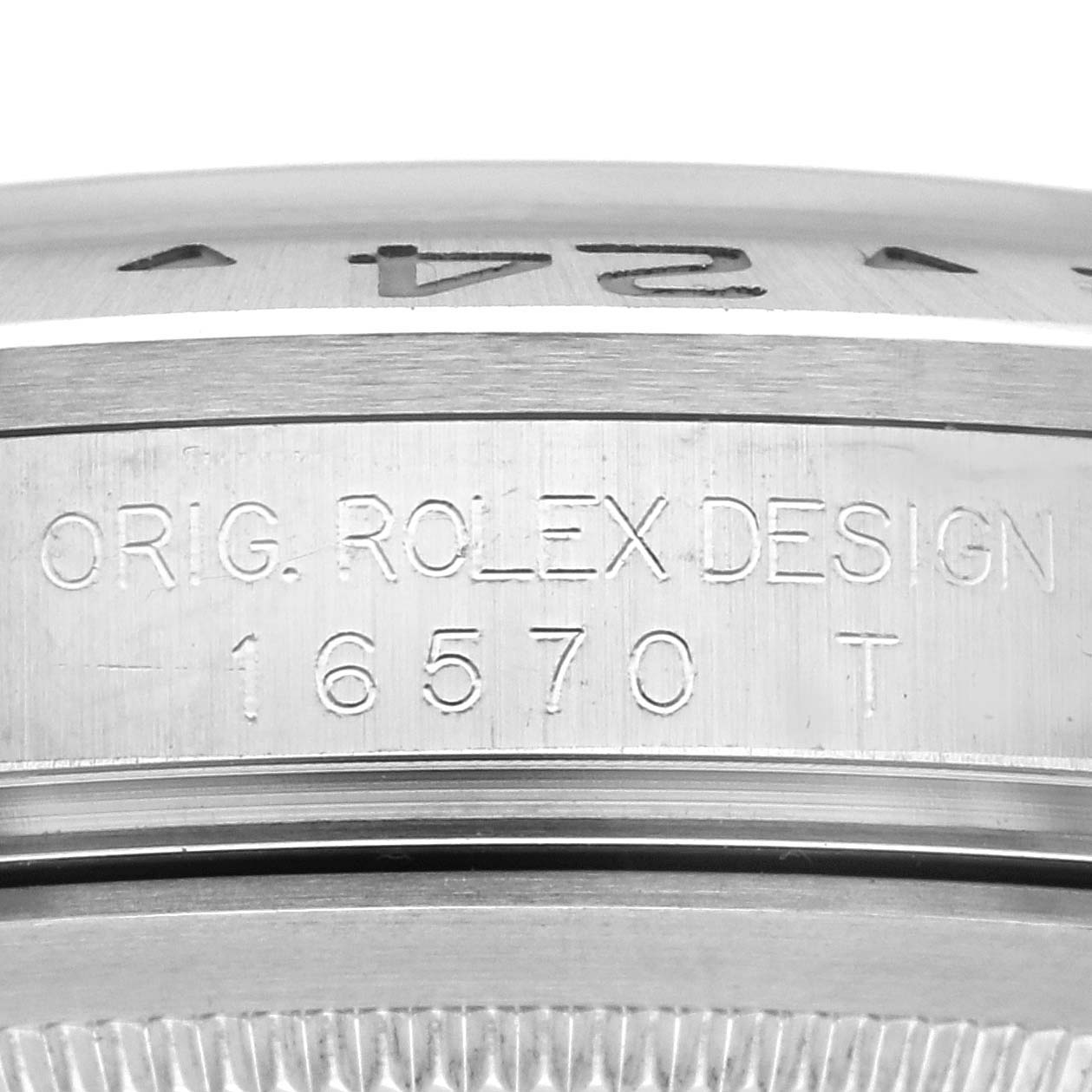 The image shows the side engraving of a Rolex Explorer 16570 Men's Stainless Steel Black Dial 16570 Men's Stainless Steel Black Dial watch, displaying the model number and "Orig. Rolex Design."