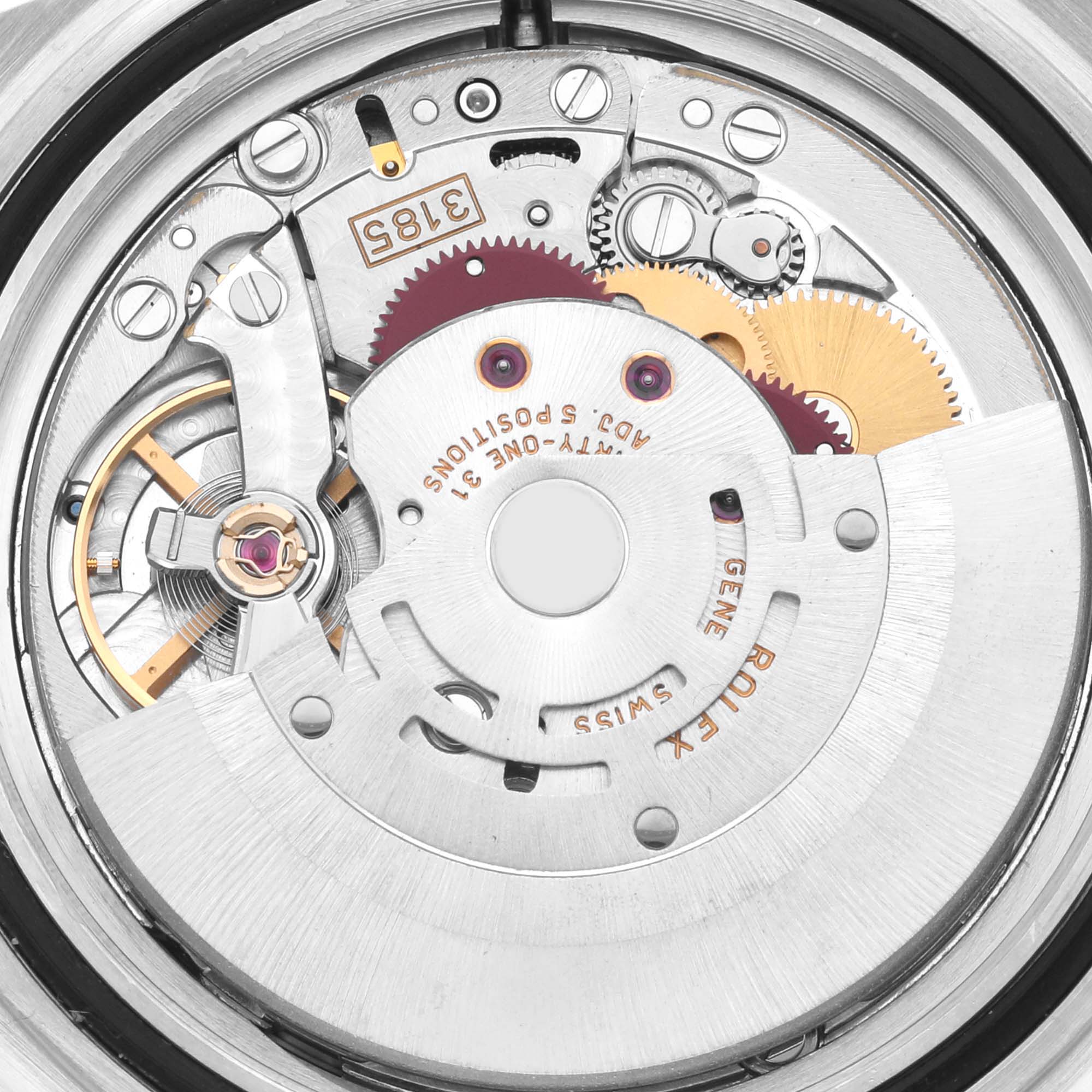 The image shows the internal movement mechanism of a Rolex Explorer 16570 Men's Stainless Steel White Dial 16570 Men's Stainless Steel White Dial, highlighting gears and the rotor.