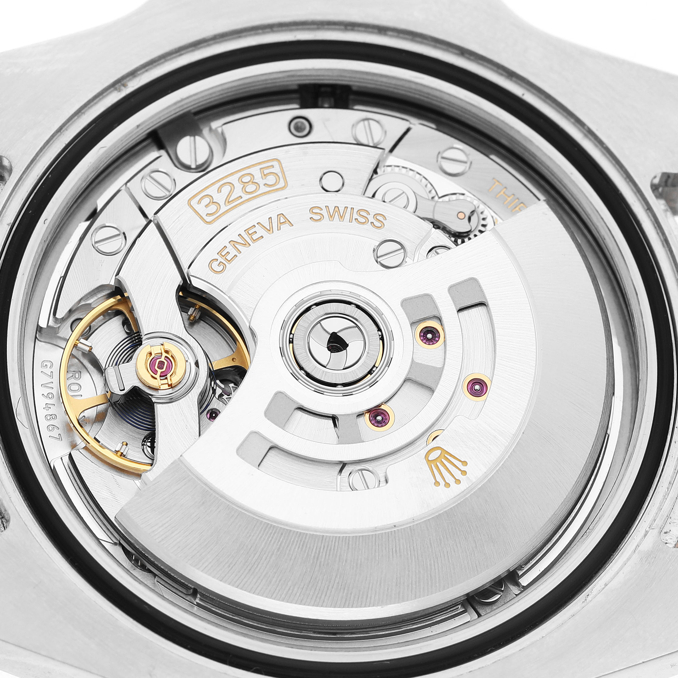The image shows the movement of a Rolex GMT-Master 126711 Men's Steel and Gold (two tone) Black Dial, highlighting the rotor and mechanism from the back angle.